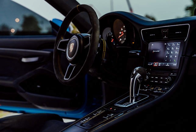 Green glass-metallic background with statistic cards