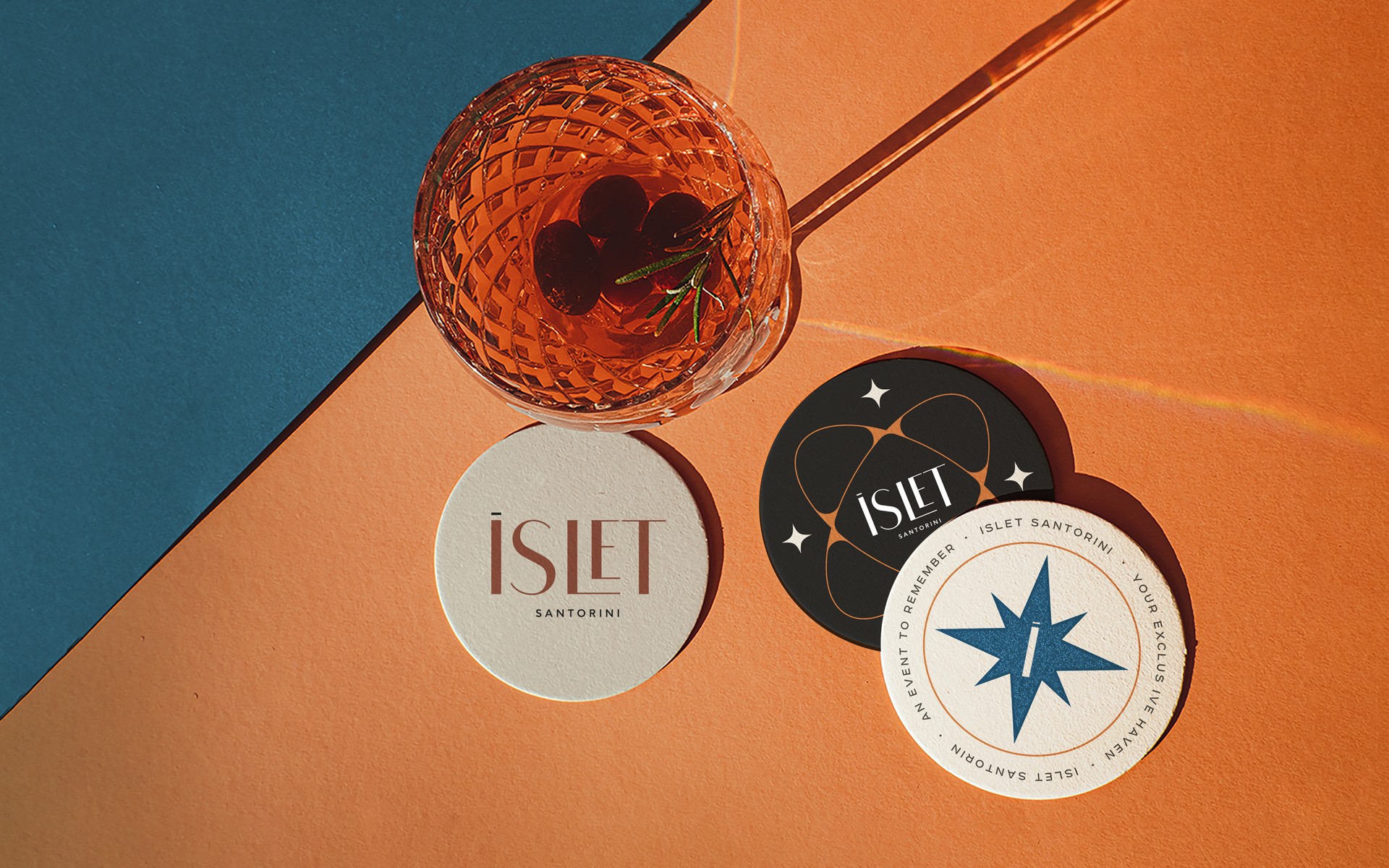 Branded items design for ISLET Santorini, featuring graphic elements that enhance the brand’s character