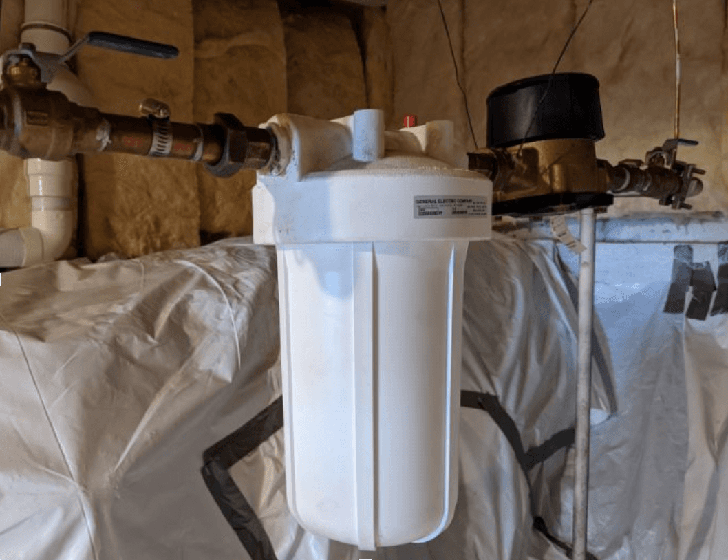 a bunch of pipes that are attached to a wall