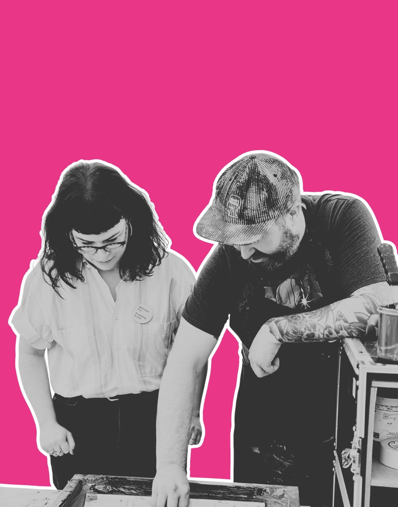 man in gray hoodie and blue denim jeans standing on brown wooden parquet flooring