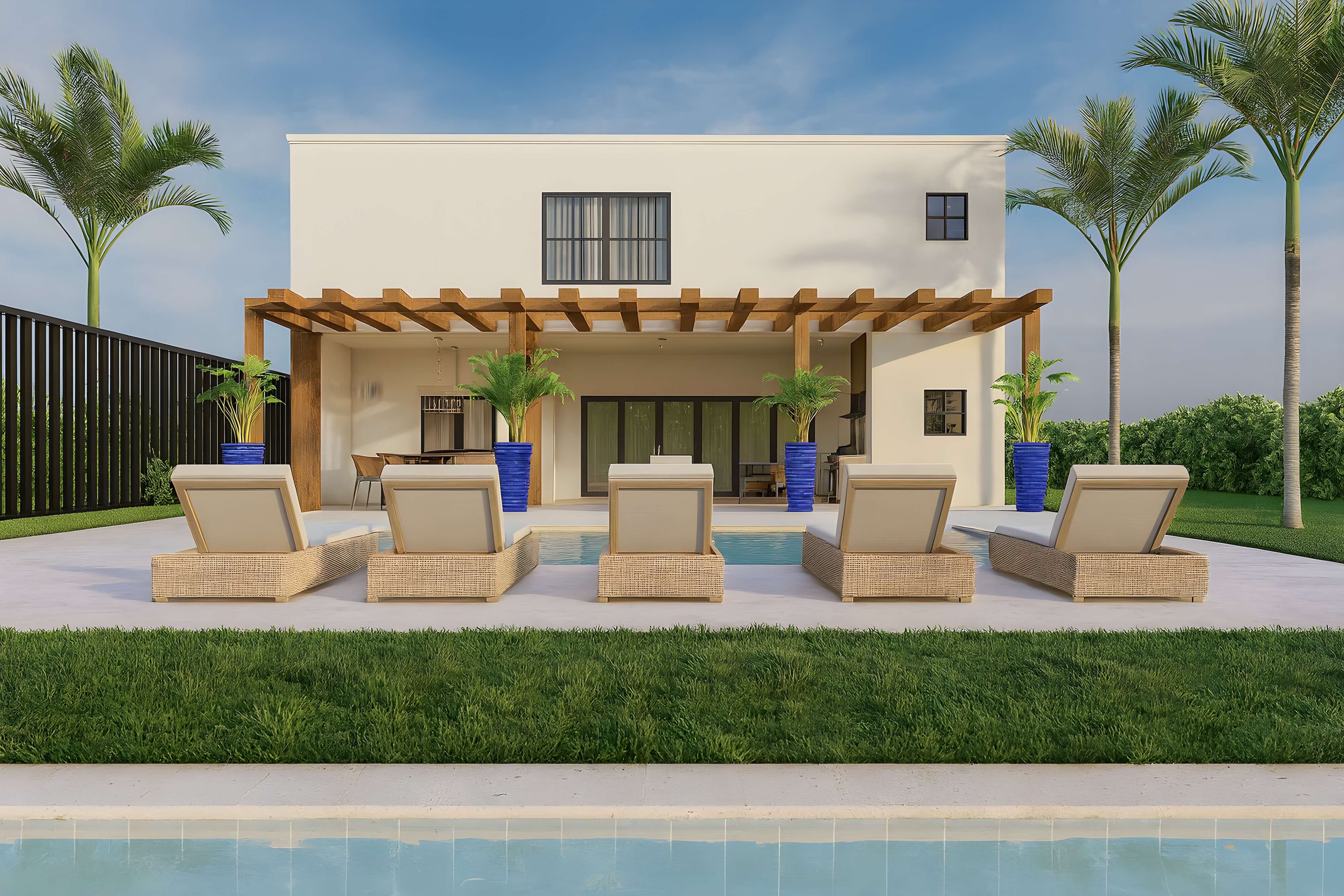 Modern poolside retreat featuring five woven wicker chaise lounges facing a sleek pool, framed by tropical palm trees, vibrant blue planters, and a shaded wooden pergola attached to a contemporary villa.