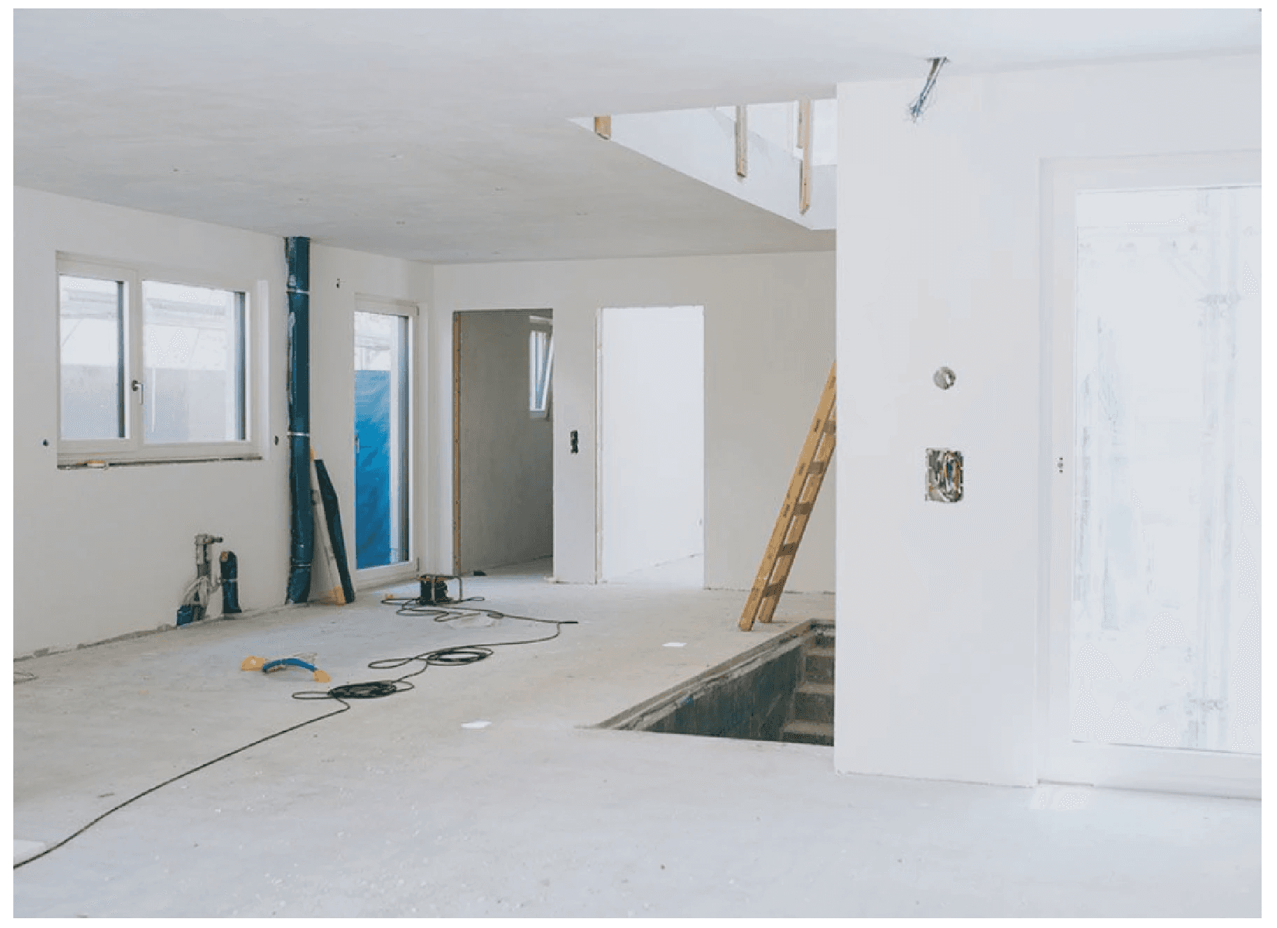 Futuristic residential architecture with cantilevered orange sections and integrated green spaces, reflecting the architect's innovative vision