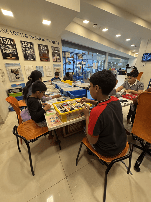 Palm trees frame a dramatic mountain valley landscape