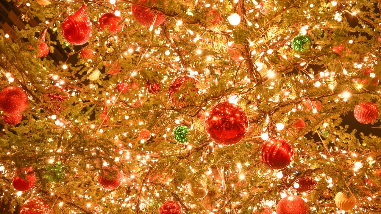 Christmas tree with warm lights and red and green ornaments