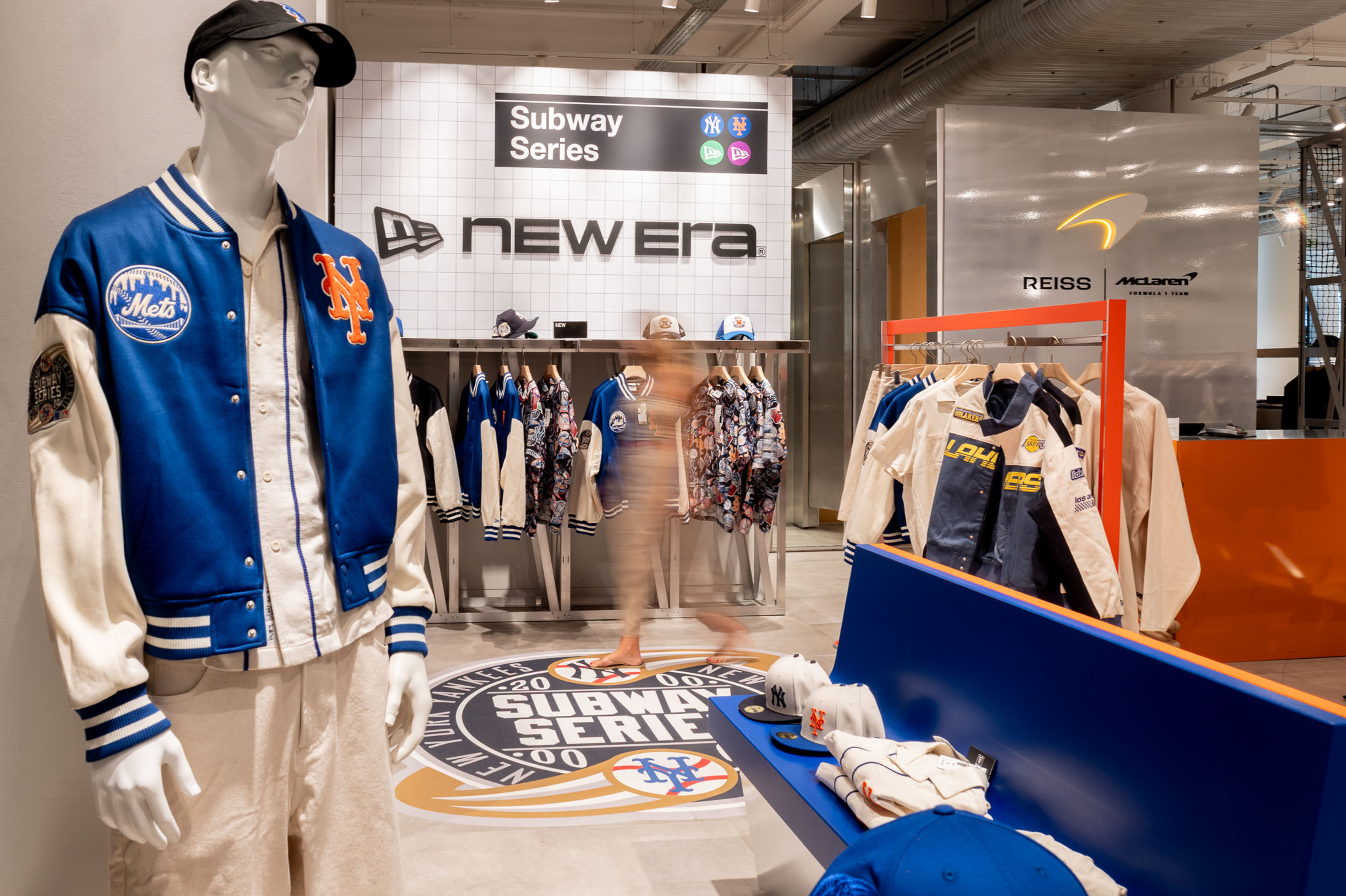Sports retail pop-up activation featuring apparel displays, branded graphics, custom merchandising fixtures and experiential retail design inspired by baseball culture