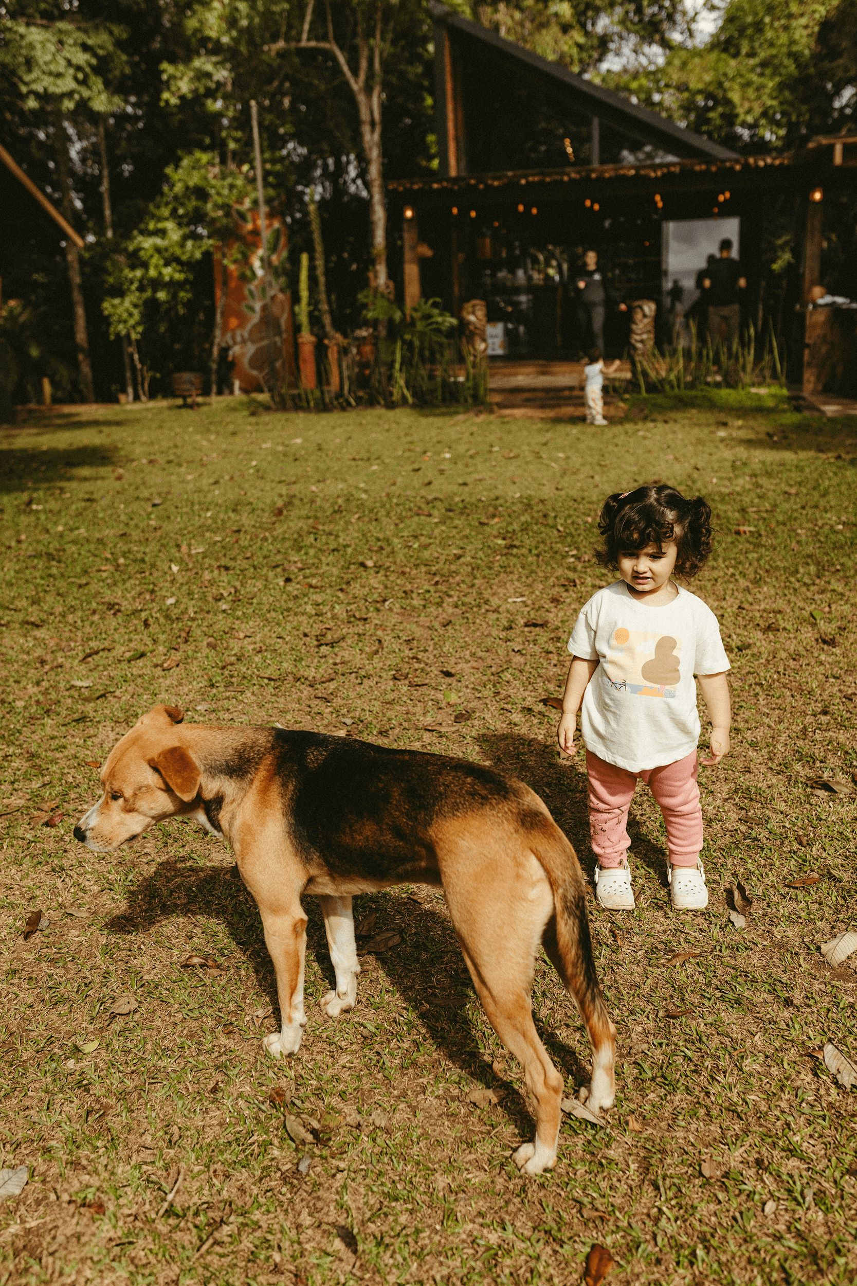 Girl playing with her dog