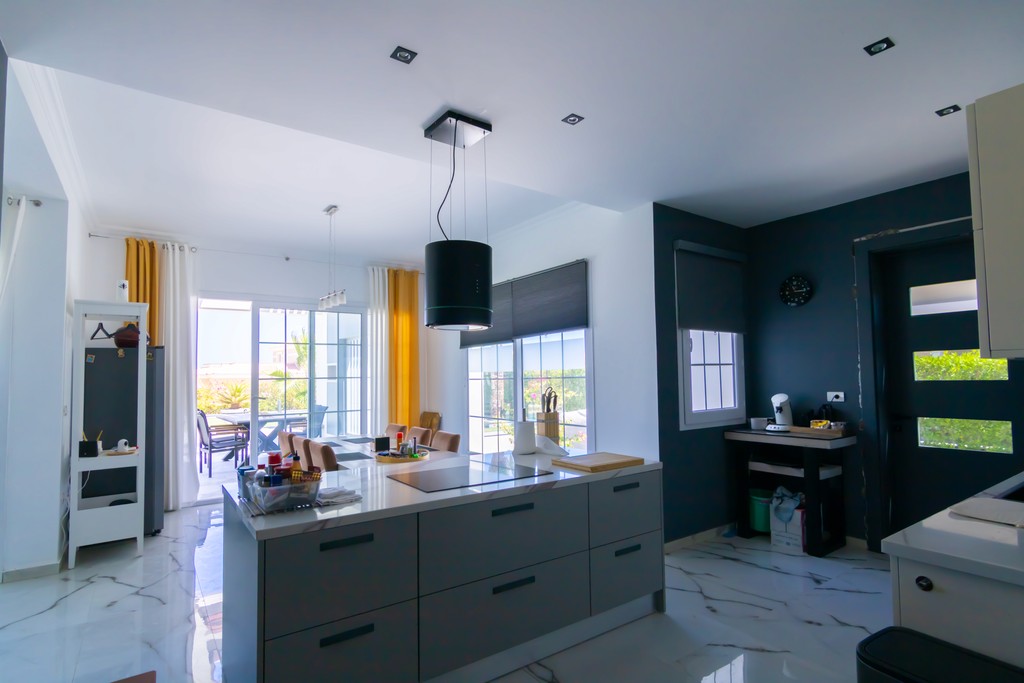 black and white wooden table and chairs