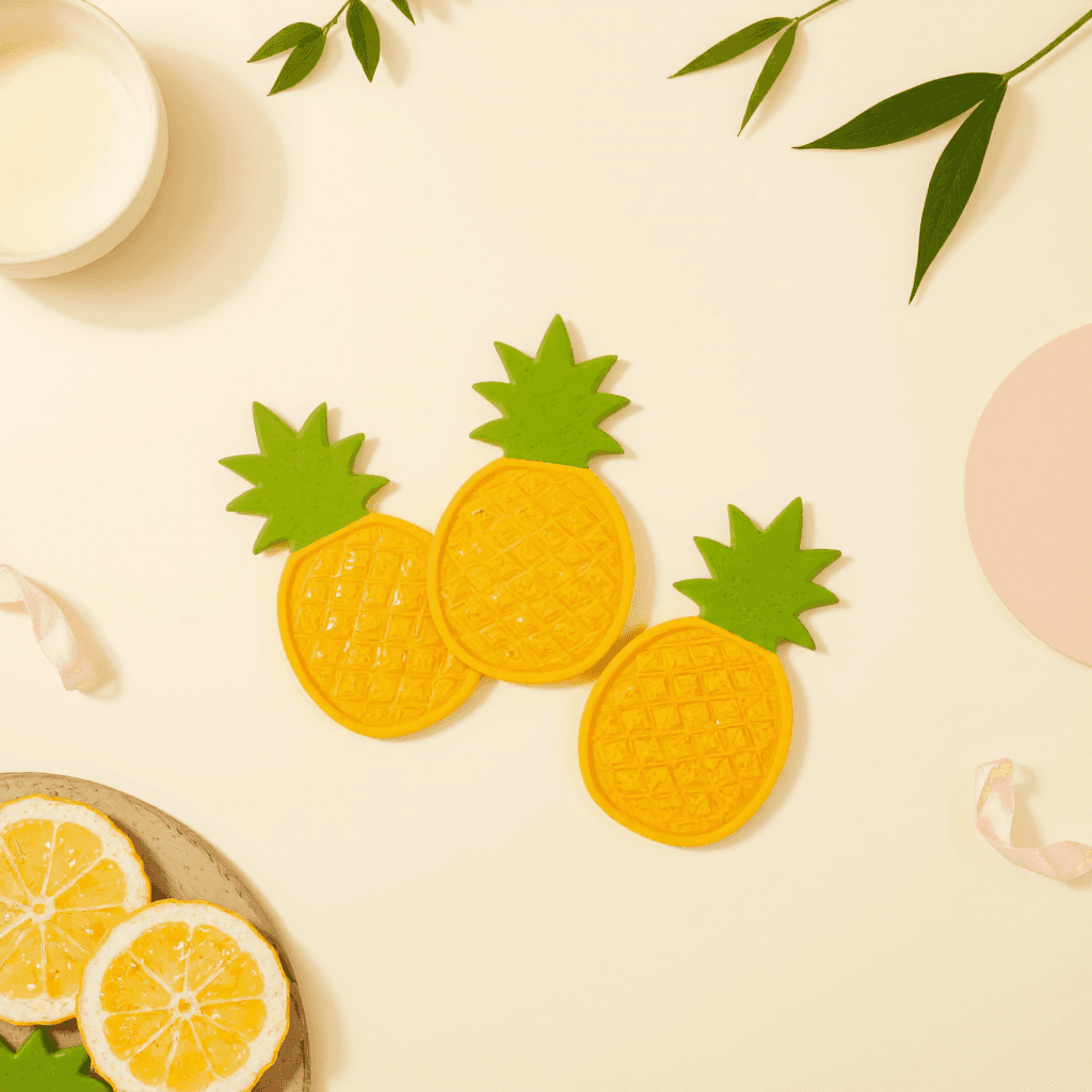 product photography of a set of pineapple-shaped coasters