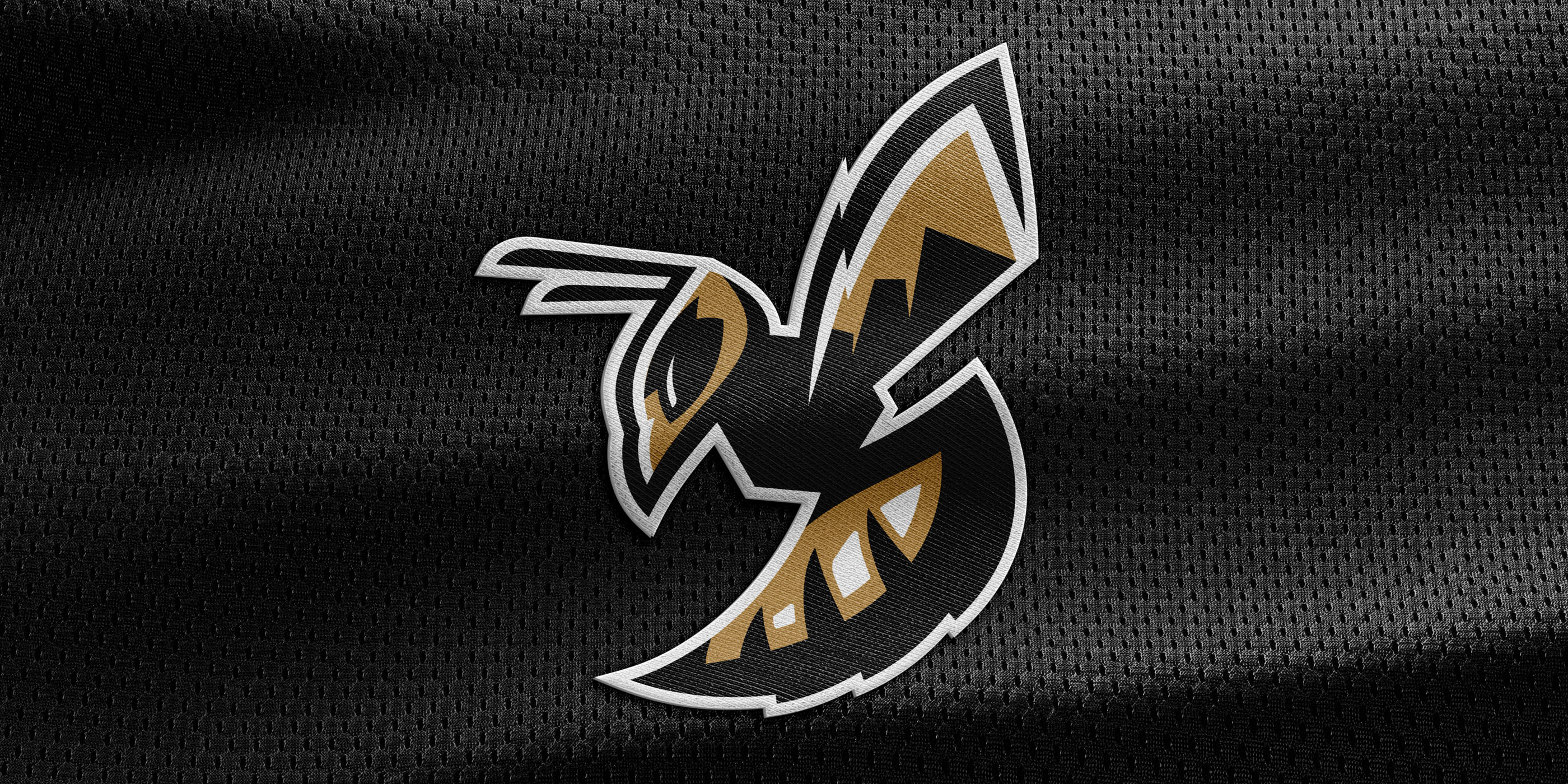 Stevensville School primary yellowjacket logo mocked up on jersey mesh.
