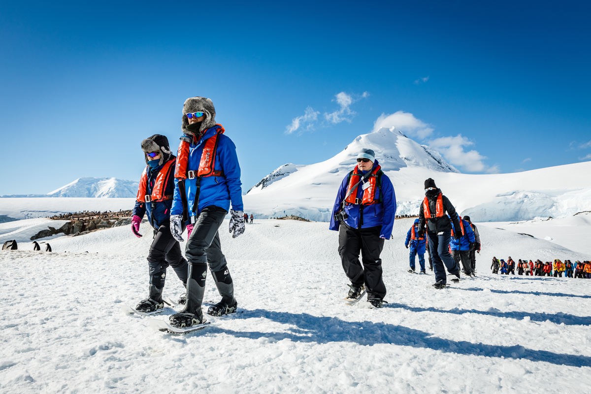 Tourists hiking in Antarctica