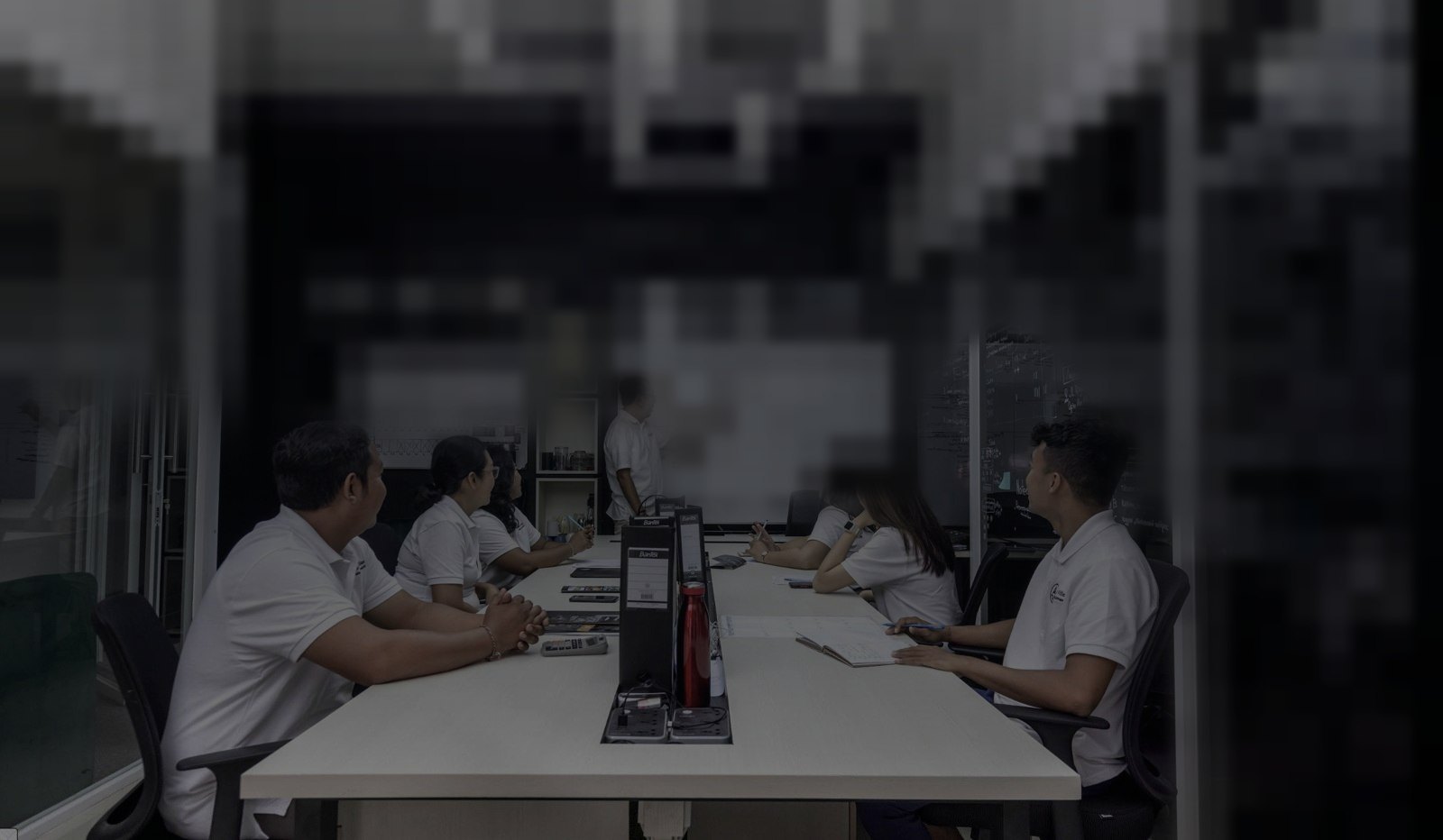 The Alex Villas Group team during a planning meeting in the Bali office