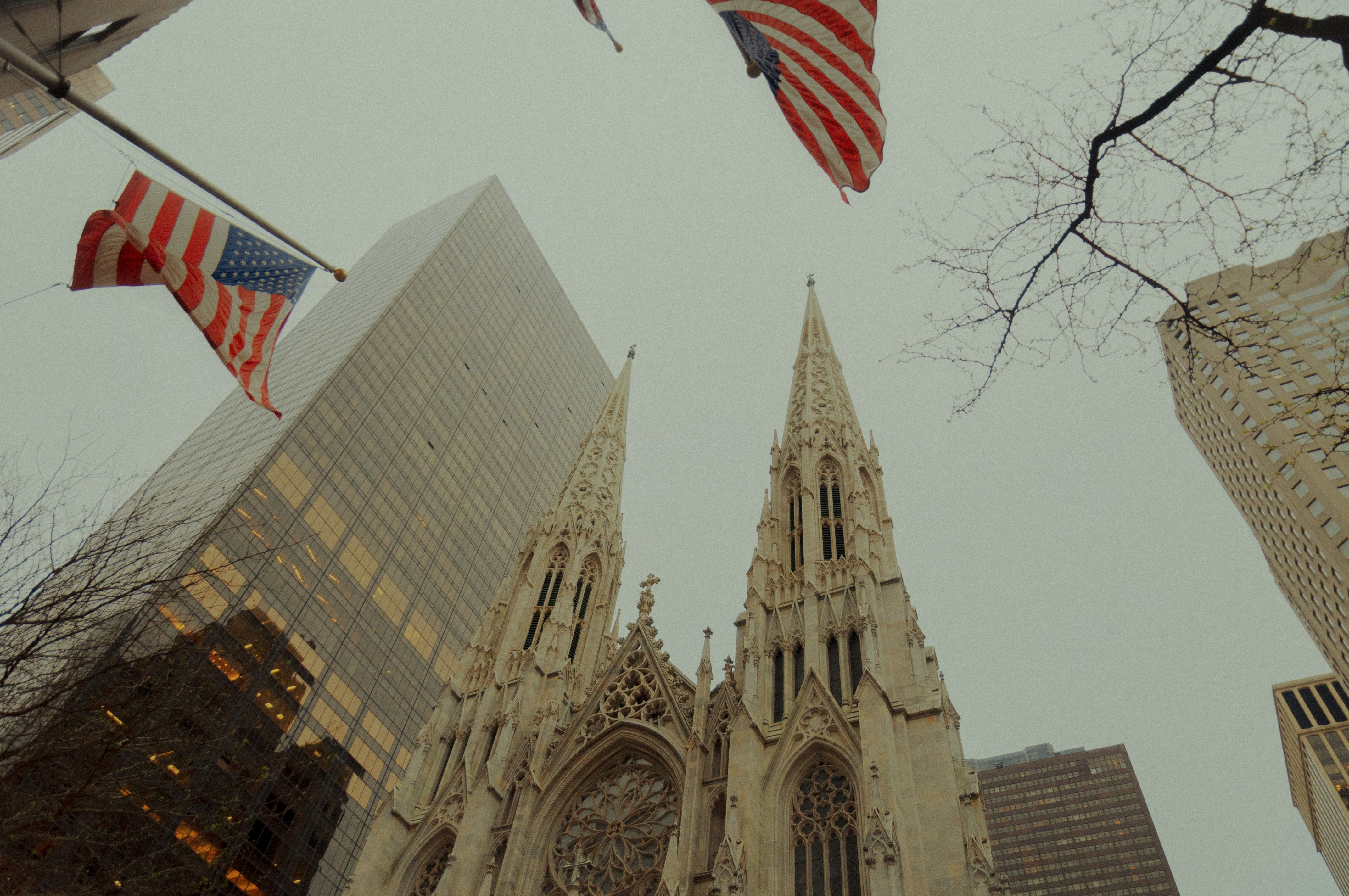 kids lying on a glass land and smiling