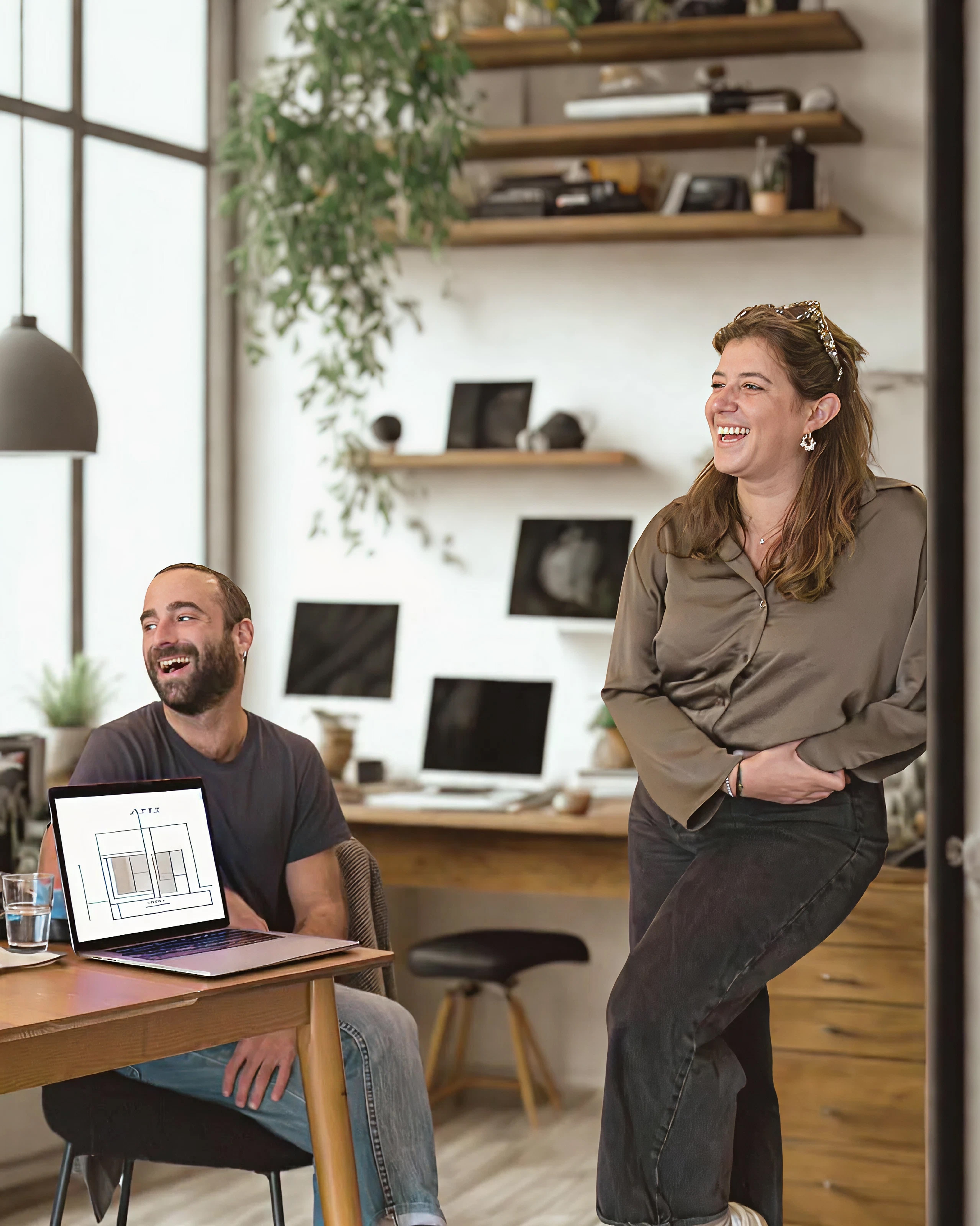 A group of three confident real estate professionals in formal business attire standing with arms crossed, representing Vistaires’ team