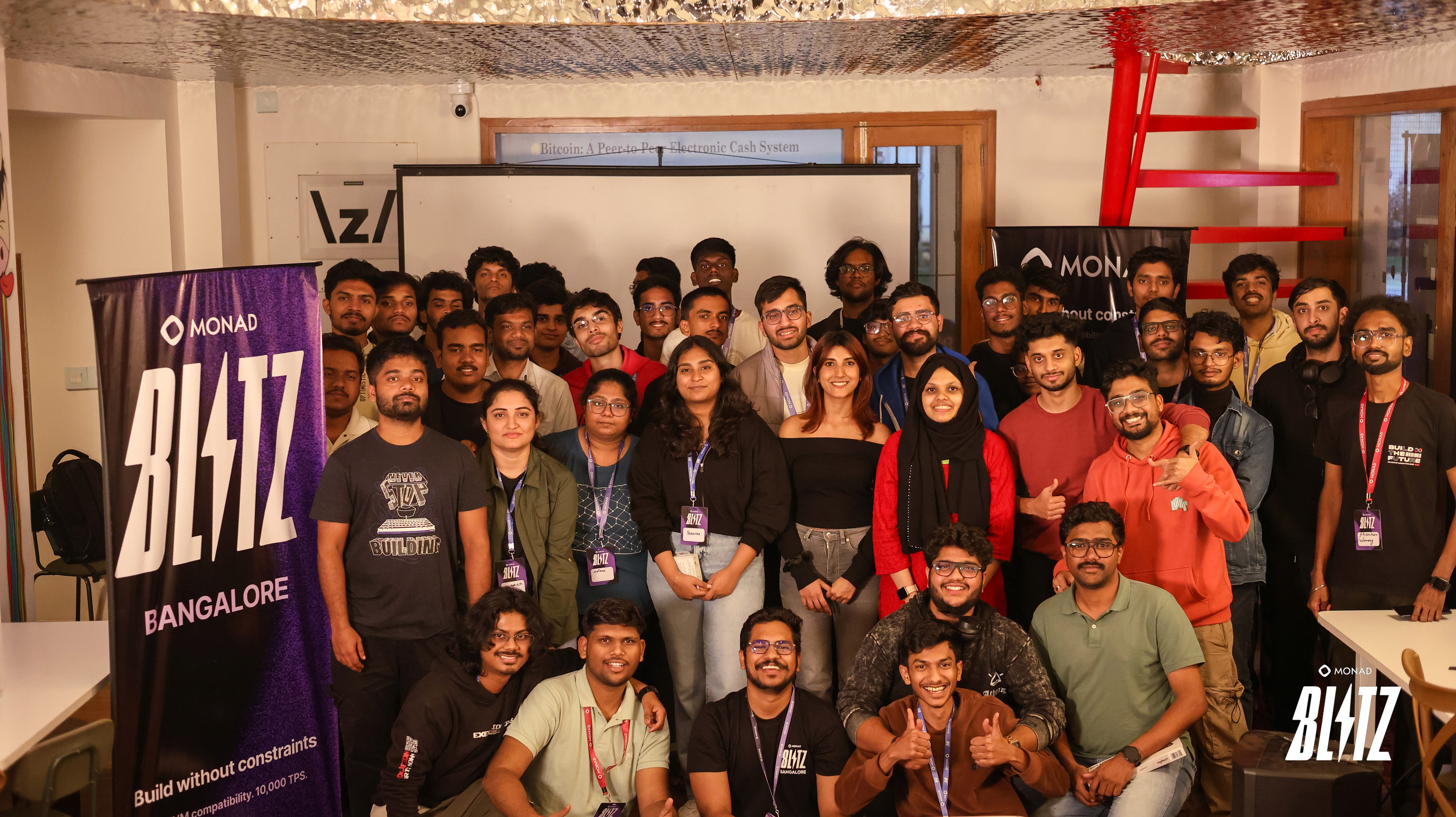 Developers collaborating during blockchain hackathon