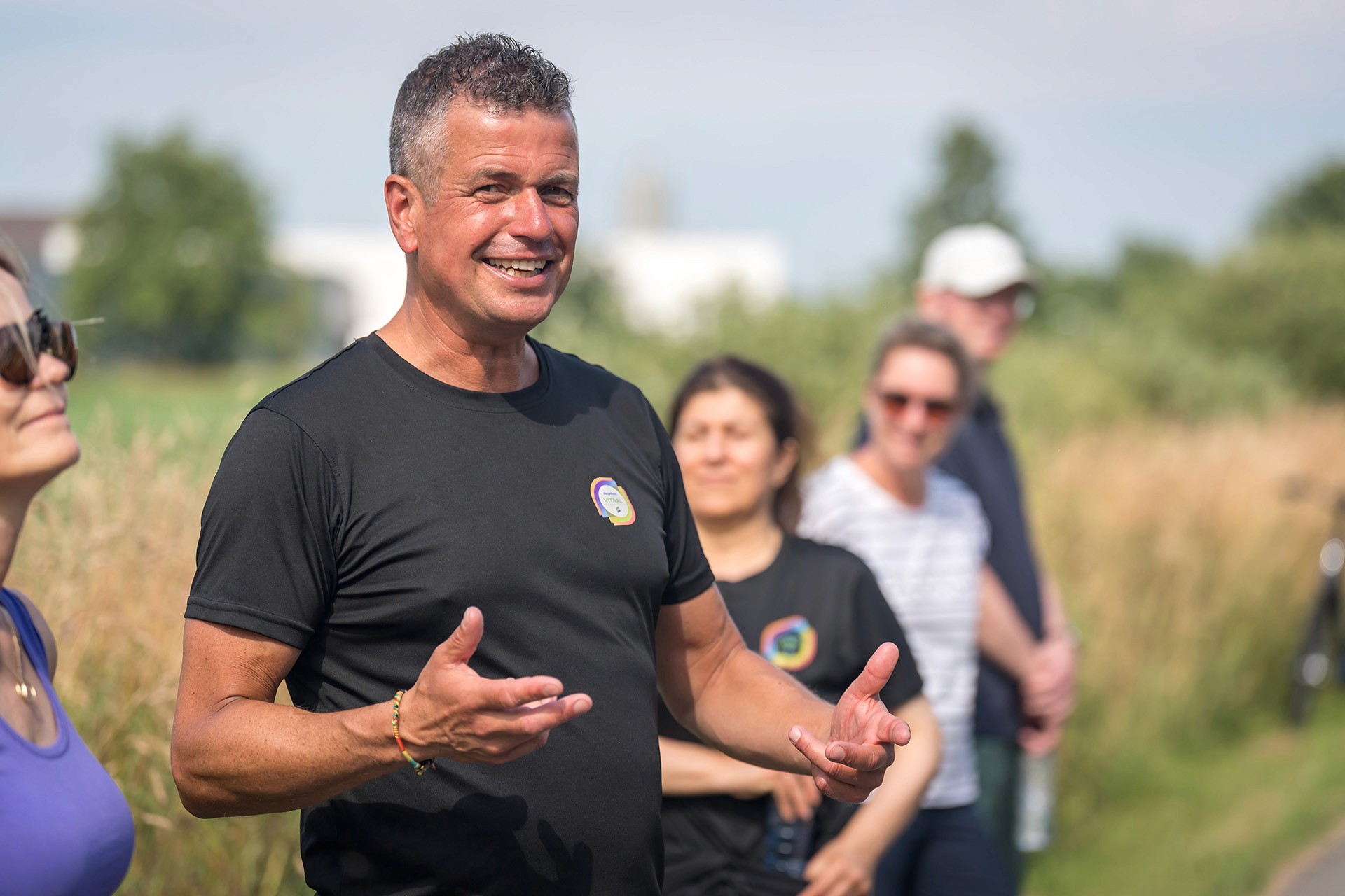 Snowboarder enjoys a downhill run on a sunny day.