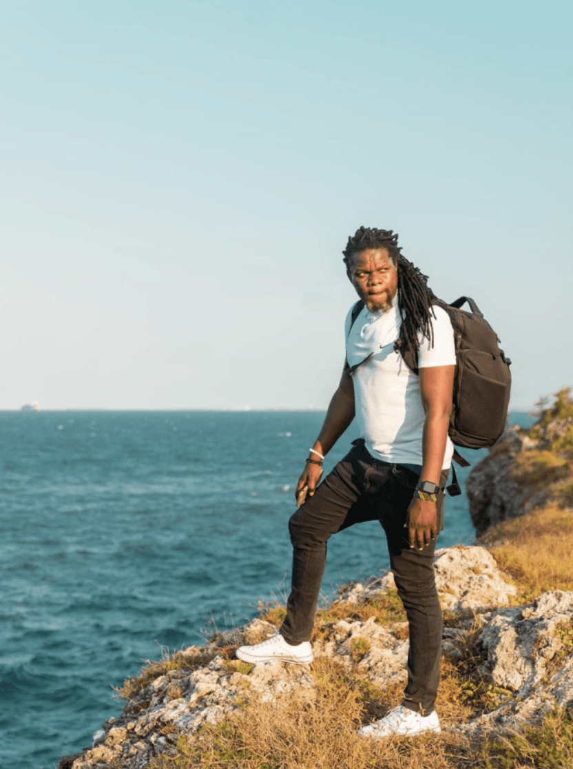 two ladies looking at a laptop and smiling