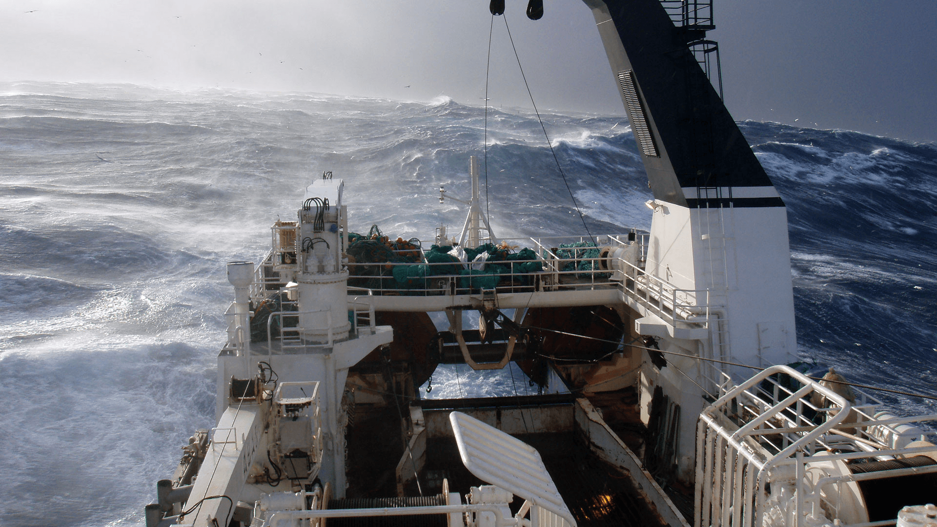sea under white clouds during daytime
