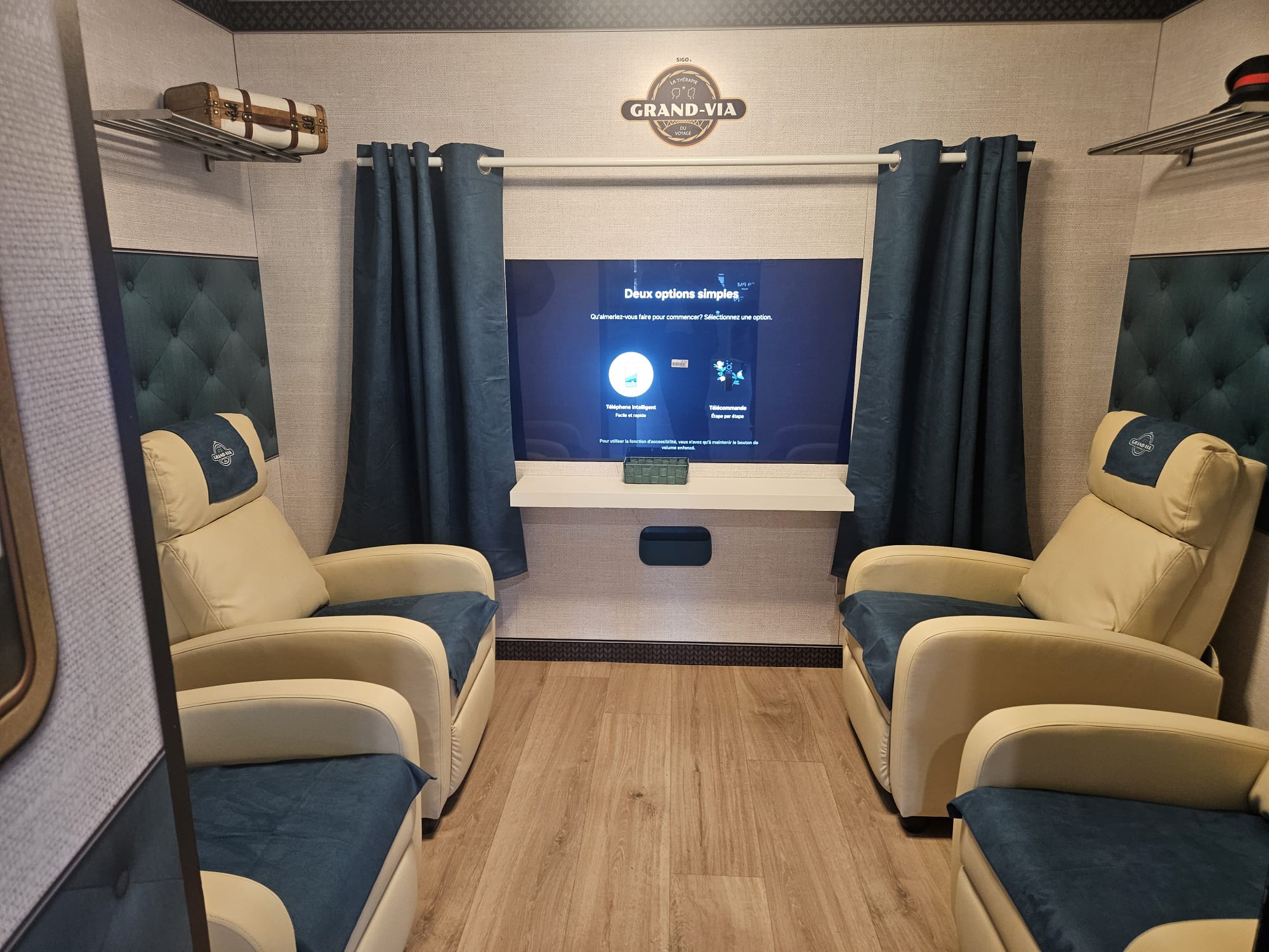 Fireworks illuminate the night sky above a city.