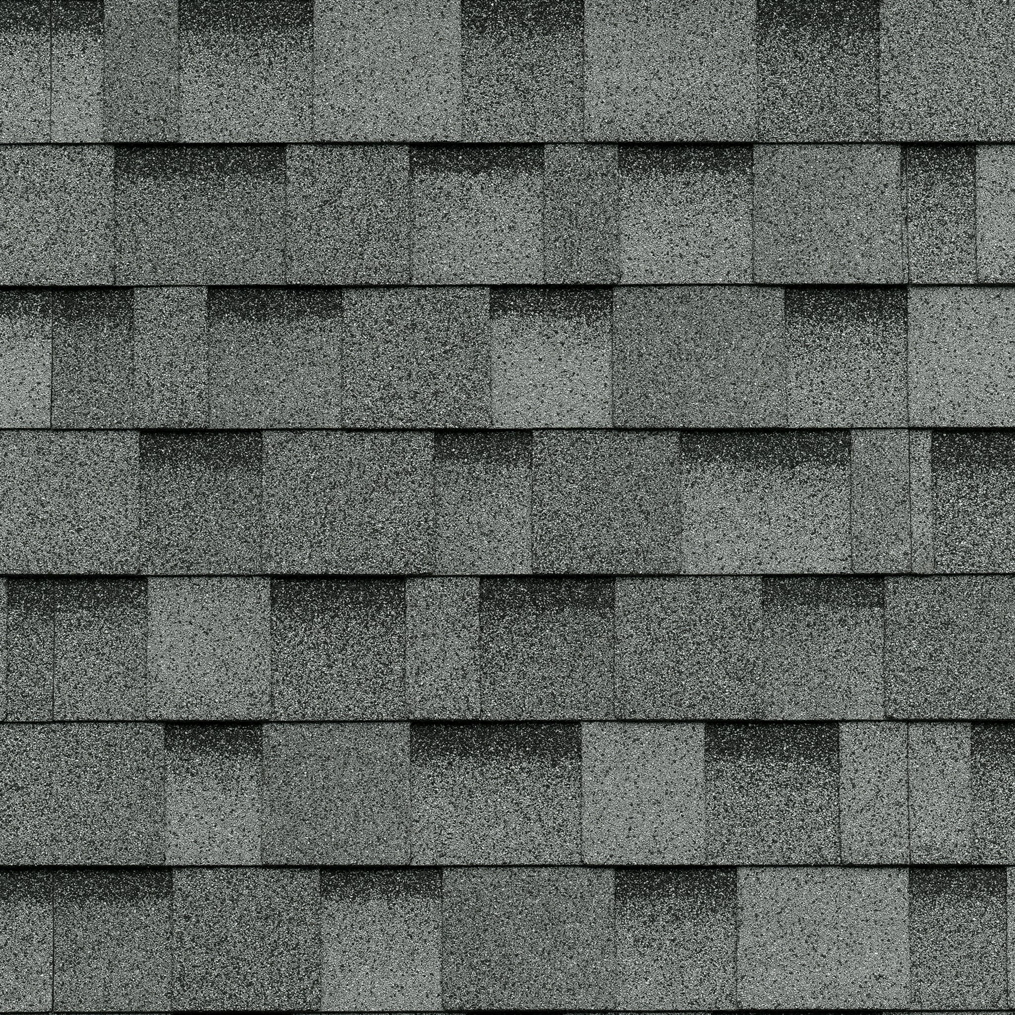 Close-up texture of gray architectural asphalt roof shingles
