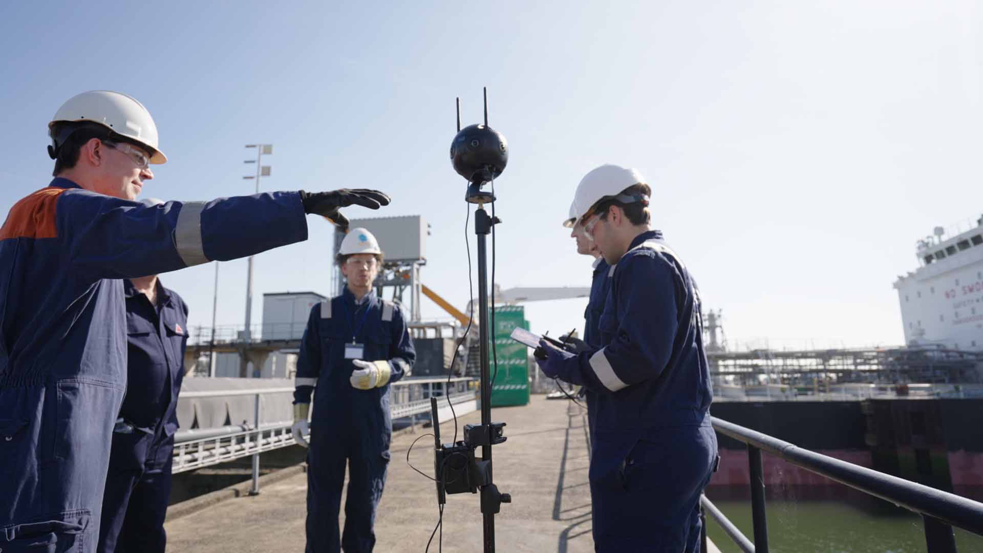 Group of people relaxing outdoors on a field or lawn