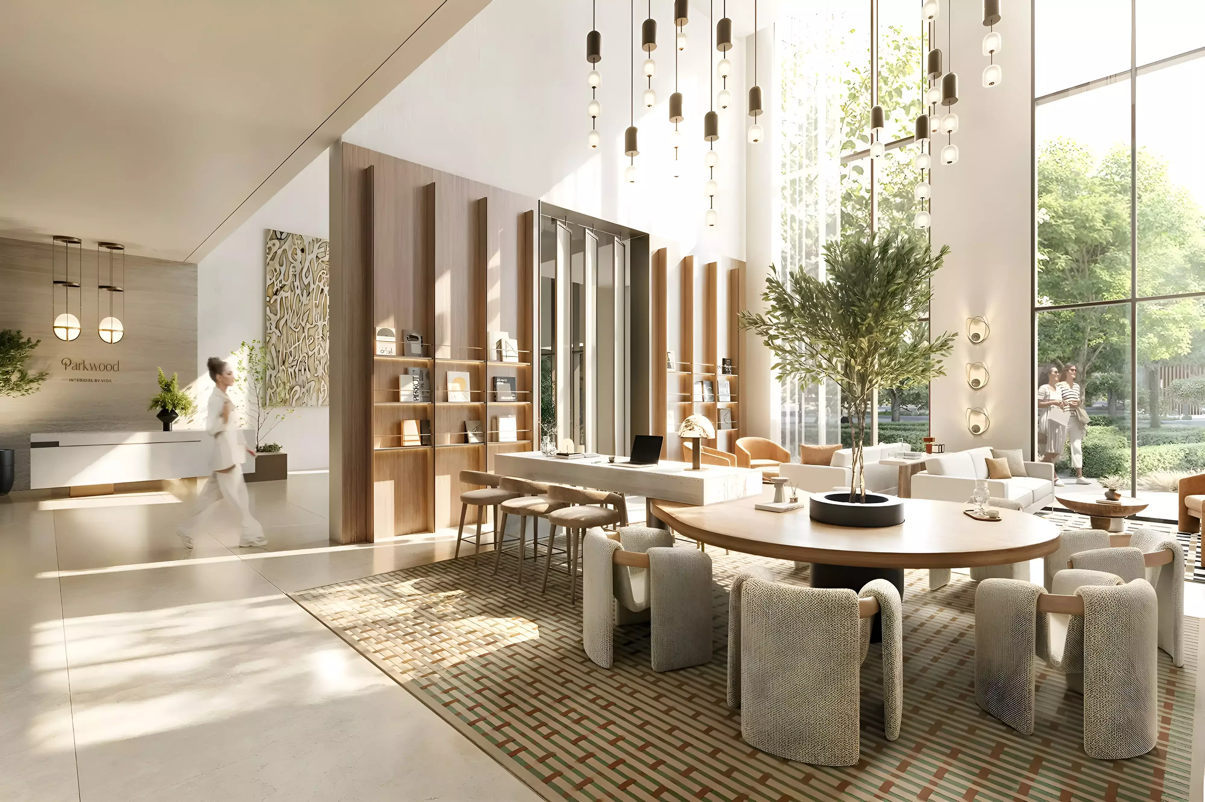 Sunlit lobby with library, lounge areas, and natural materials at Emaar Parkwood in Dubai