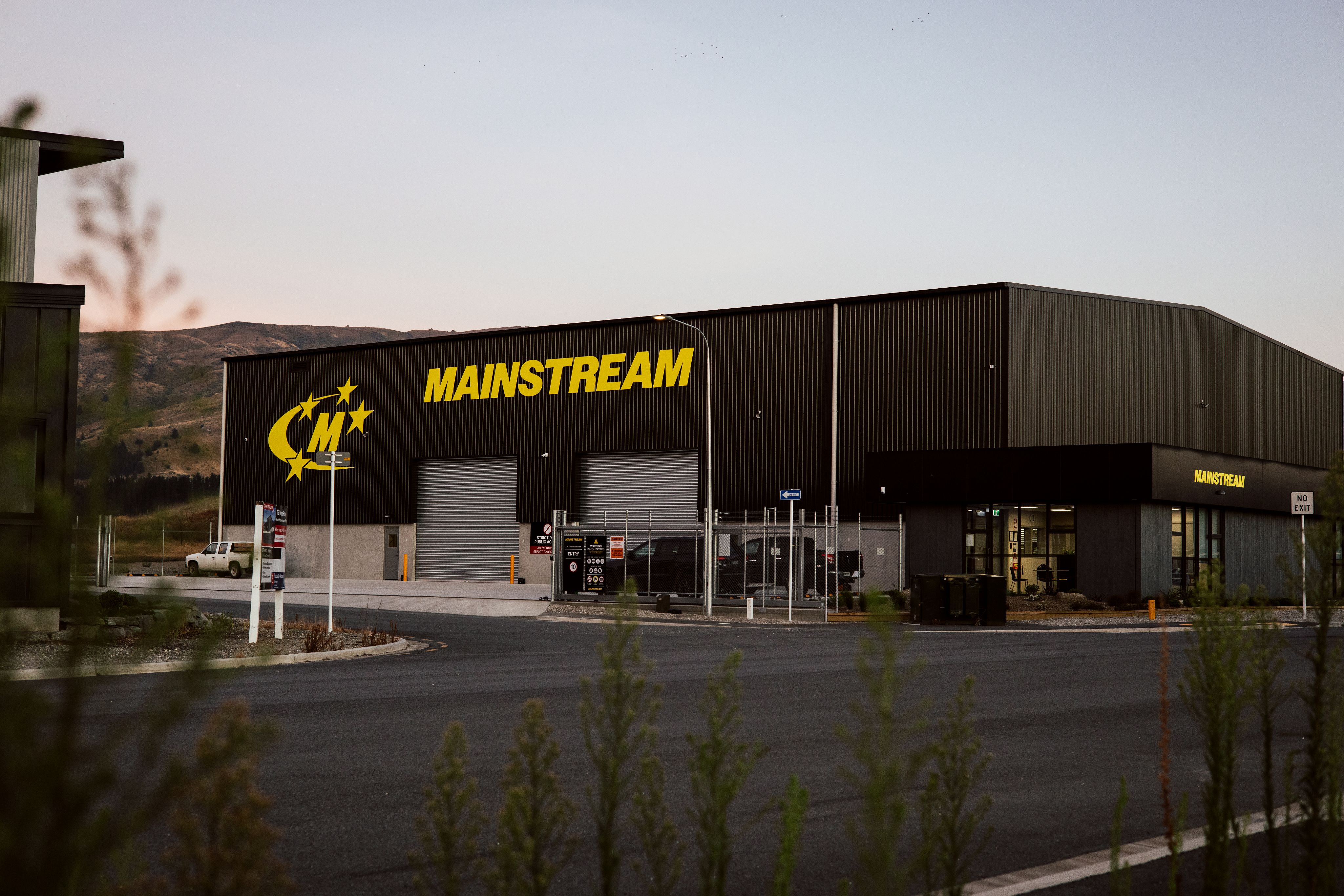 Technician in safety gear working on a solar panel