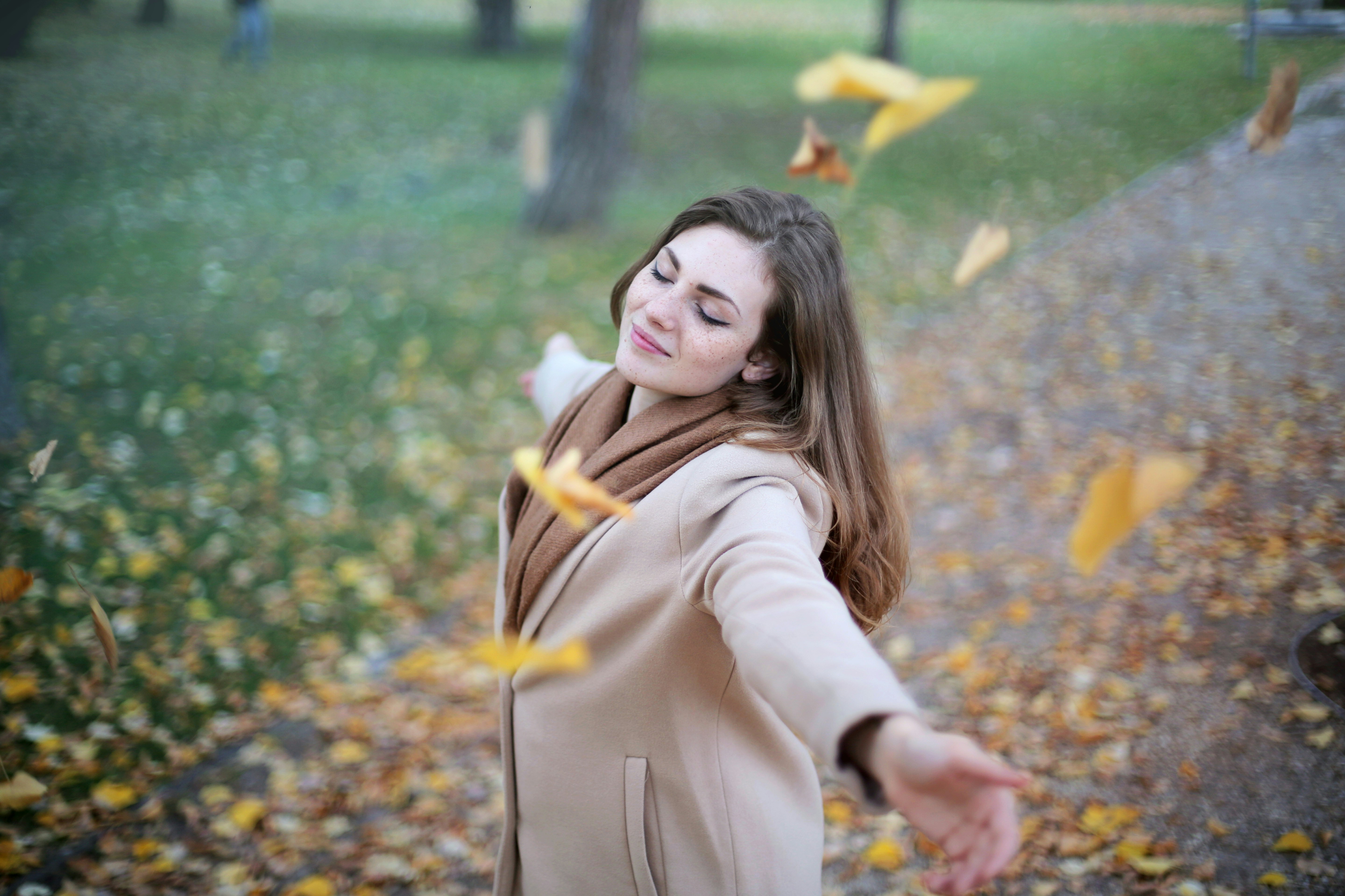 woman enjoying the weather - Fall Picture Outfits