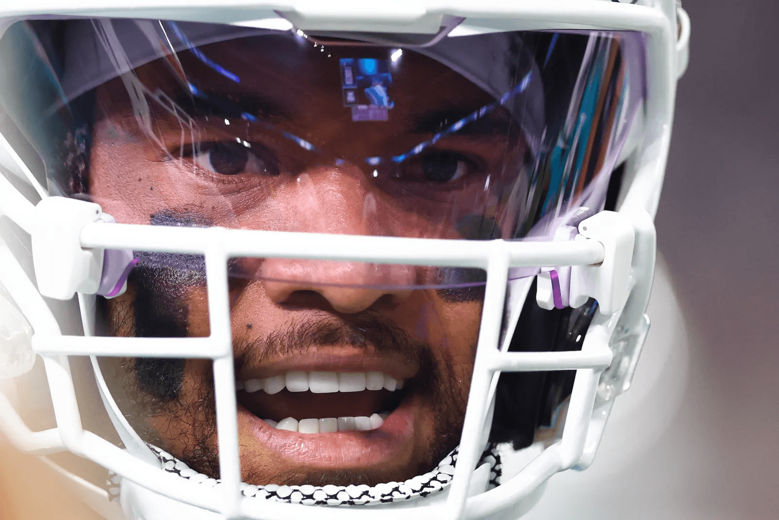 why football players wear eye black, why do football players paint their faces, eye black football meaning, does eye black work in football, face paint football reasons, football eye black purpose, why NFL players wear eye black, college football face paint meaning, football face paint intimidation, football face paint tradition, psychological effects of face paint football, eye black vs face paint football, NFL face paint rules, football players black stripes under eyes, does eye black reduce glare, football game face paint psychology, why defensive players wear face paint, football pregame rituals face paint, eye black glare reduction football, football war paint meaning