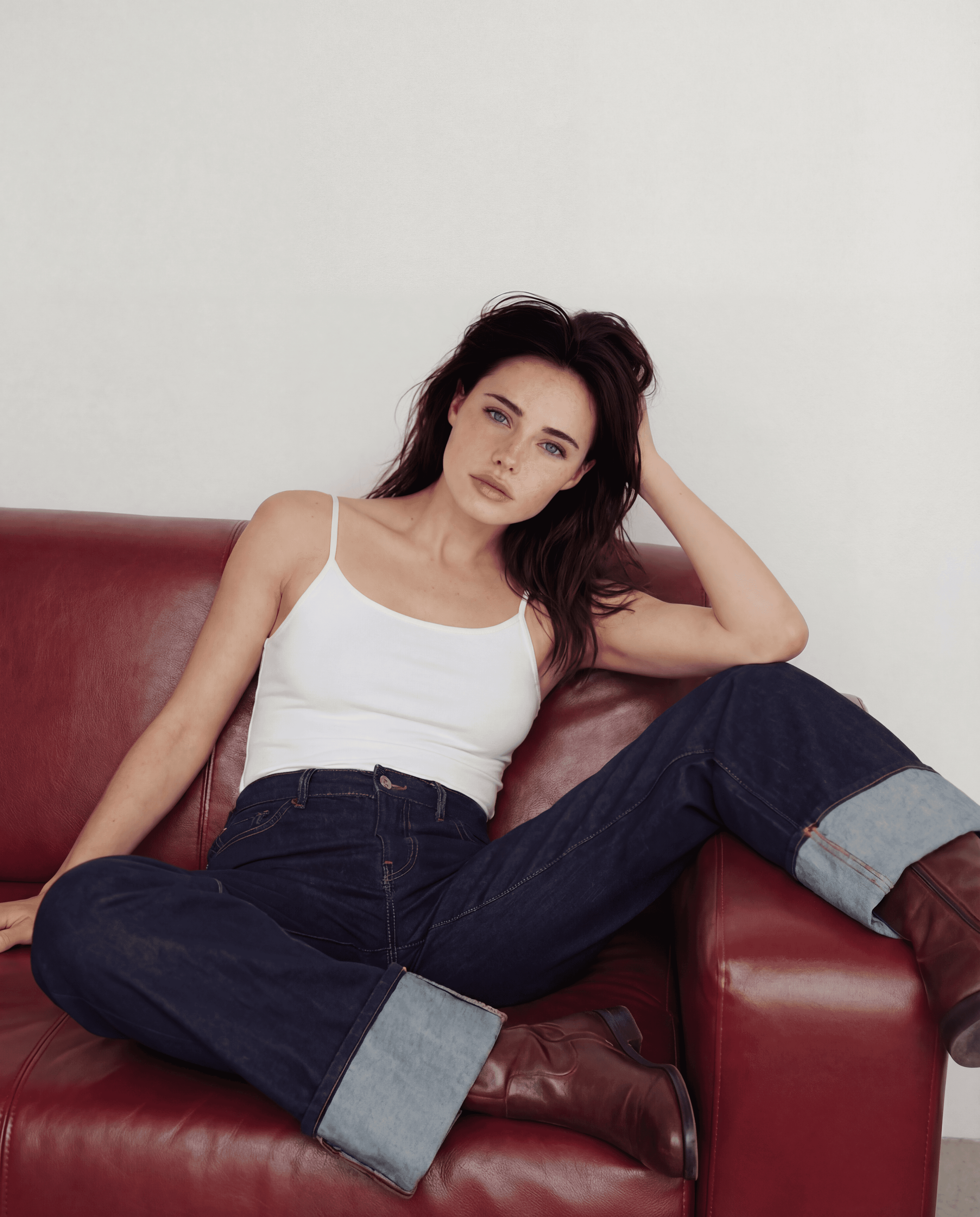 A close-up of a translucent cube illuminated by soft light, revealing its intricate facets and shimmering reflections.