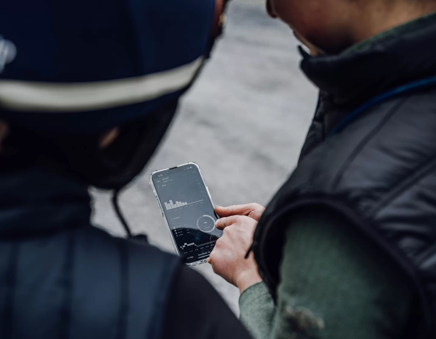 Riders looking at the app