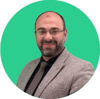 African man smiling on phone