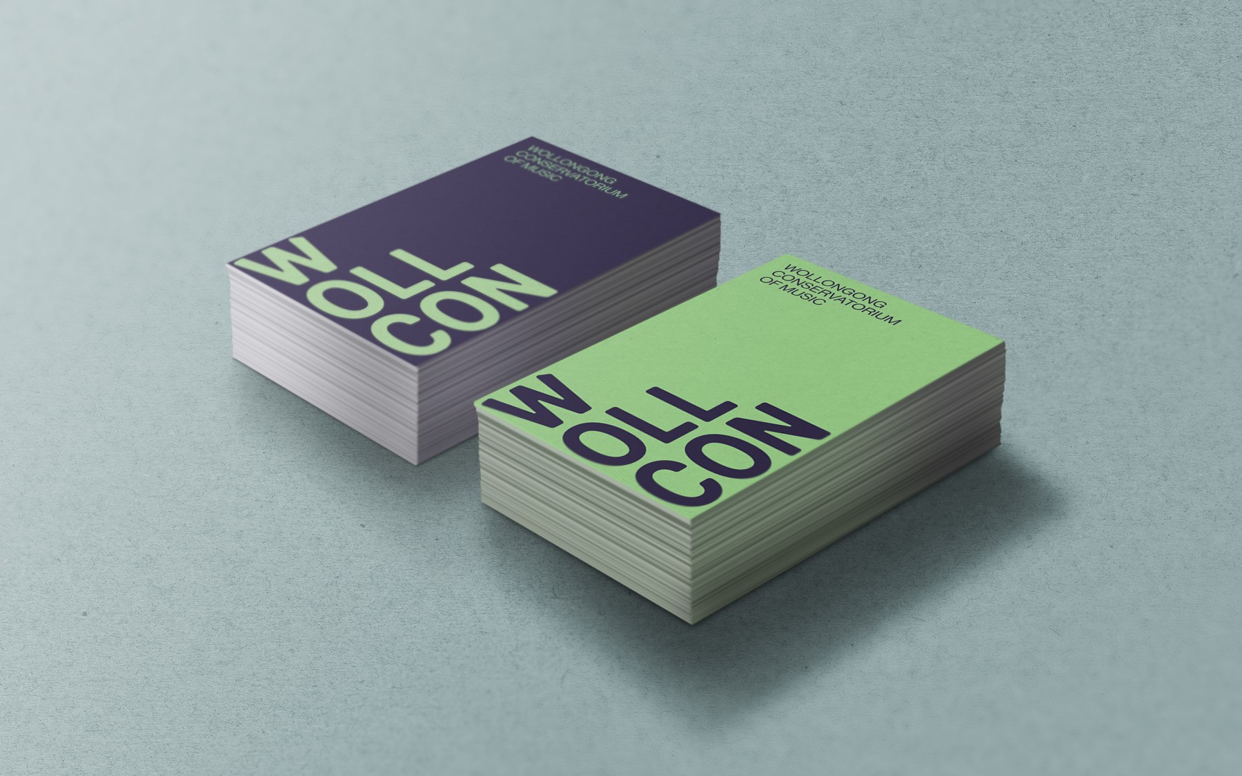 WollCon business card design displaying redesigned logo and brand colours.