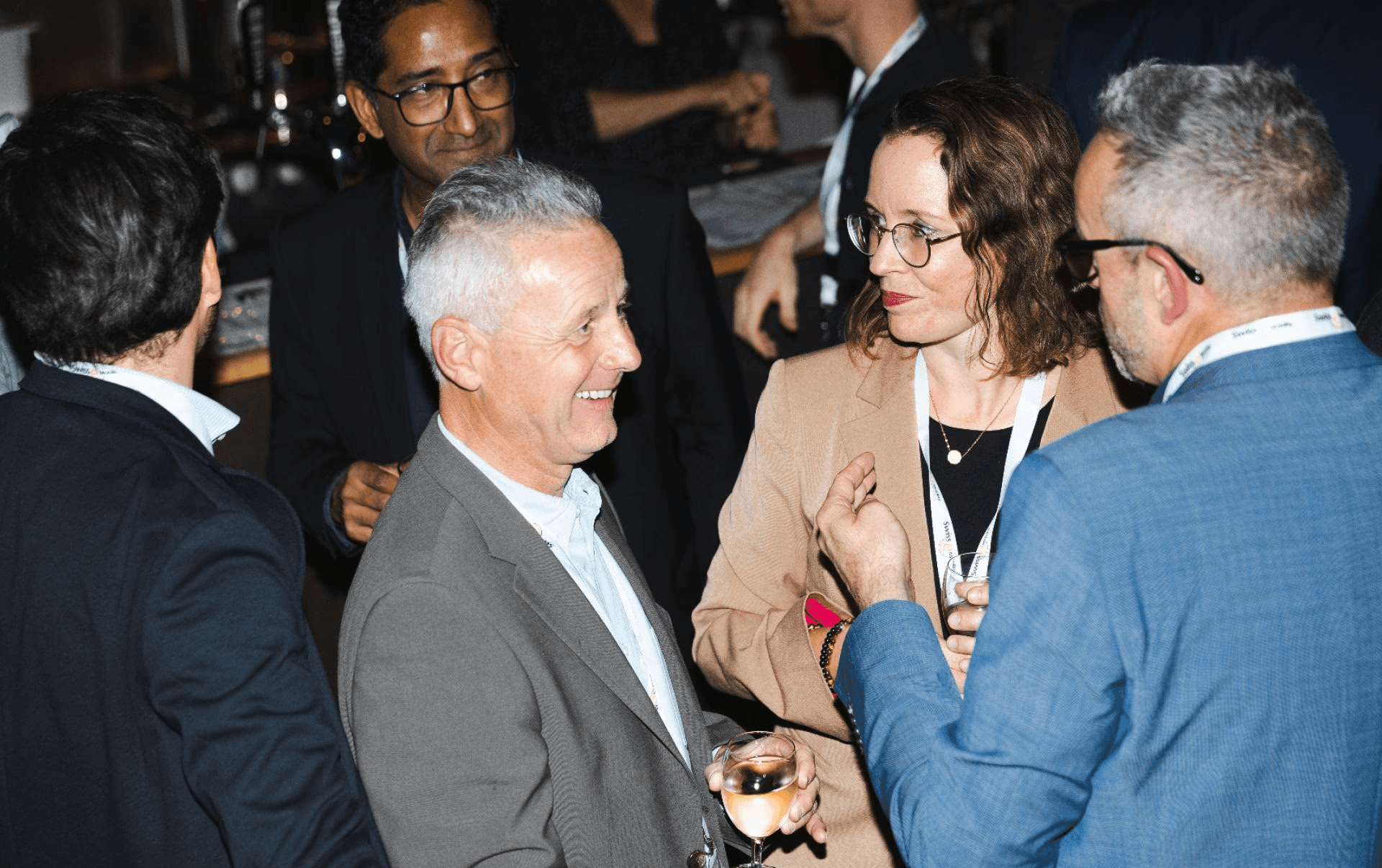 Guests networking during the 10th-anniversary celebration of the organization, where Josef Brusa and Marco Piffaretti were honored with the Golden Plug 'Lifetime Award' for their contributions to electromobility