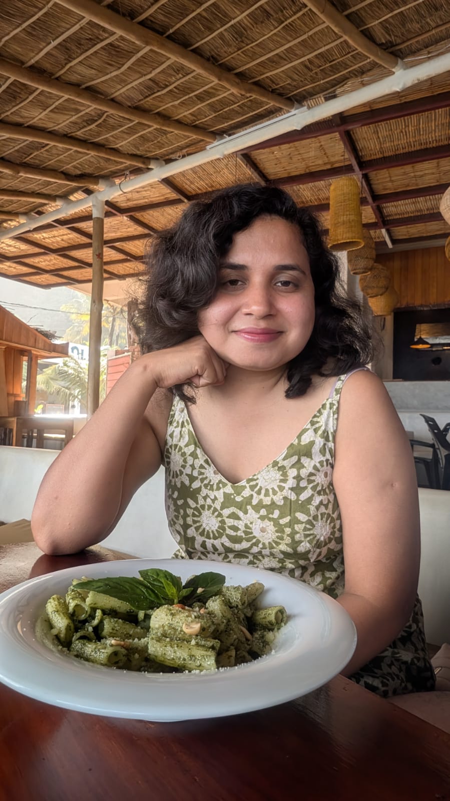 man in black jacket and brown cap