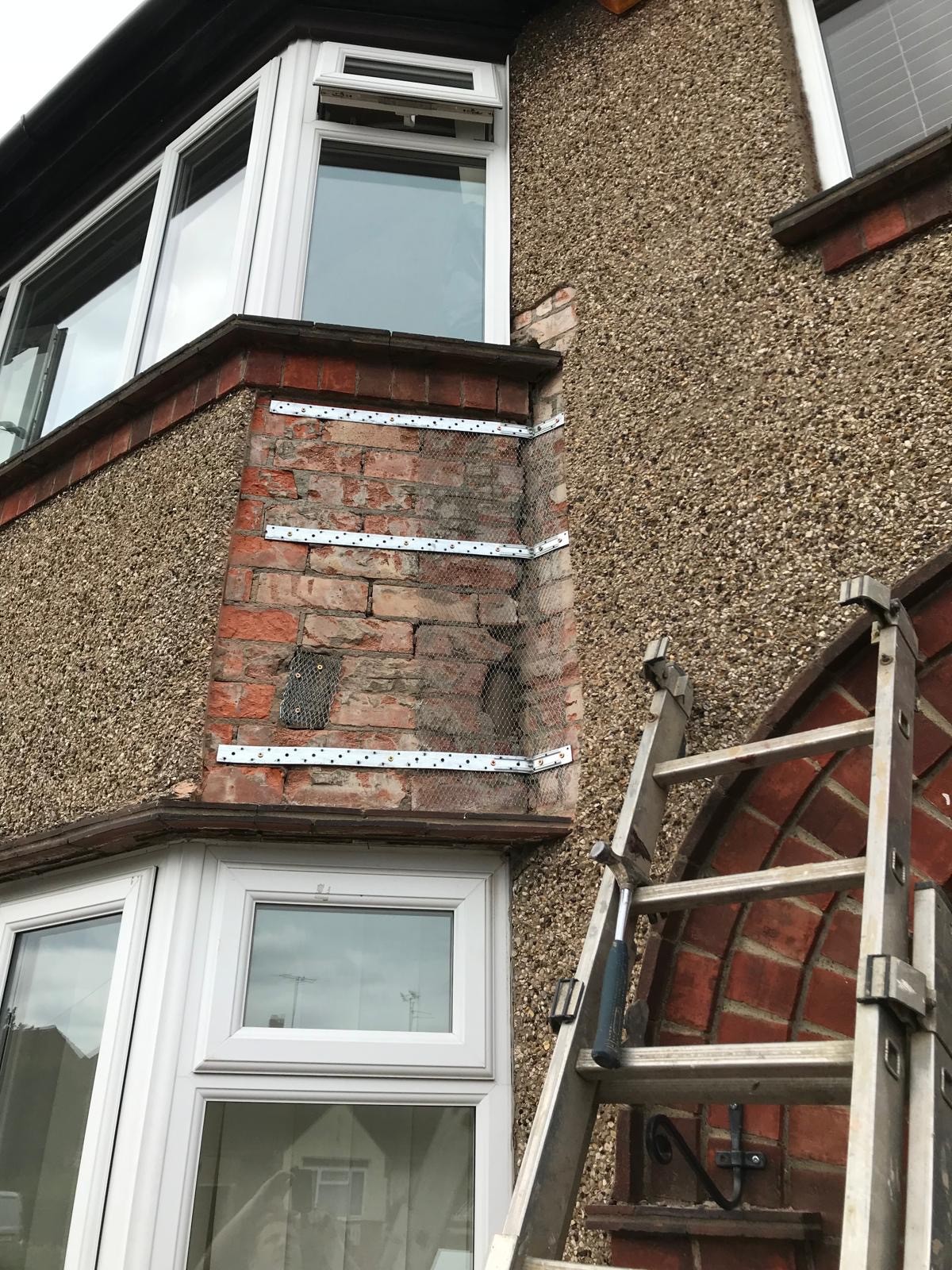 Structural brick stitching and masonry reinforcement on residential property in Northampton