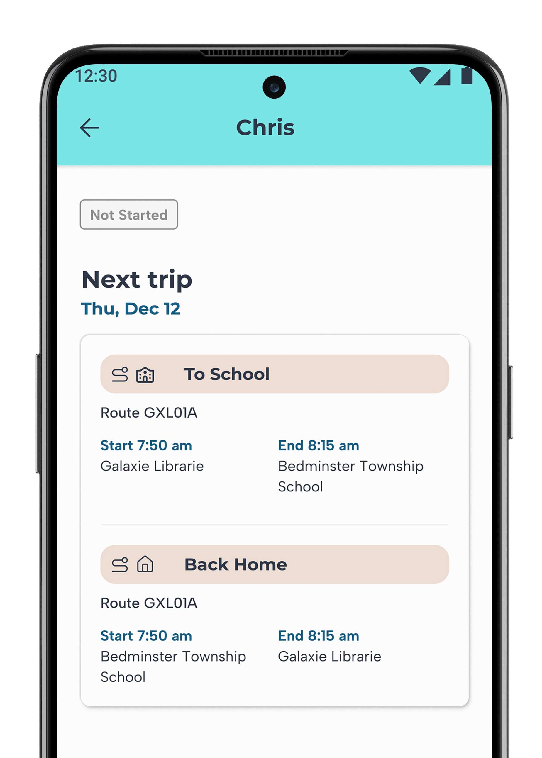 a man and a little girl sitting at a table looking at a cell phone