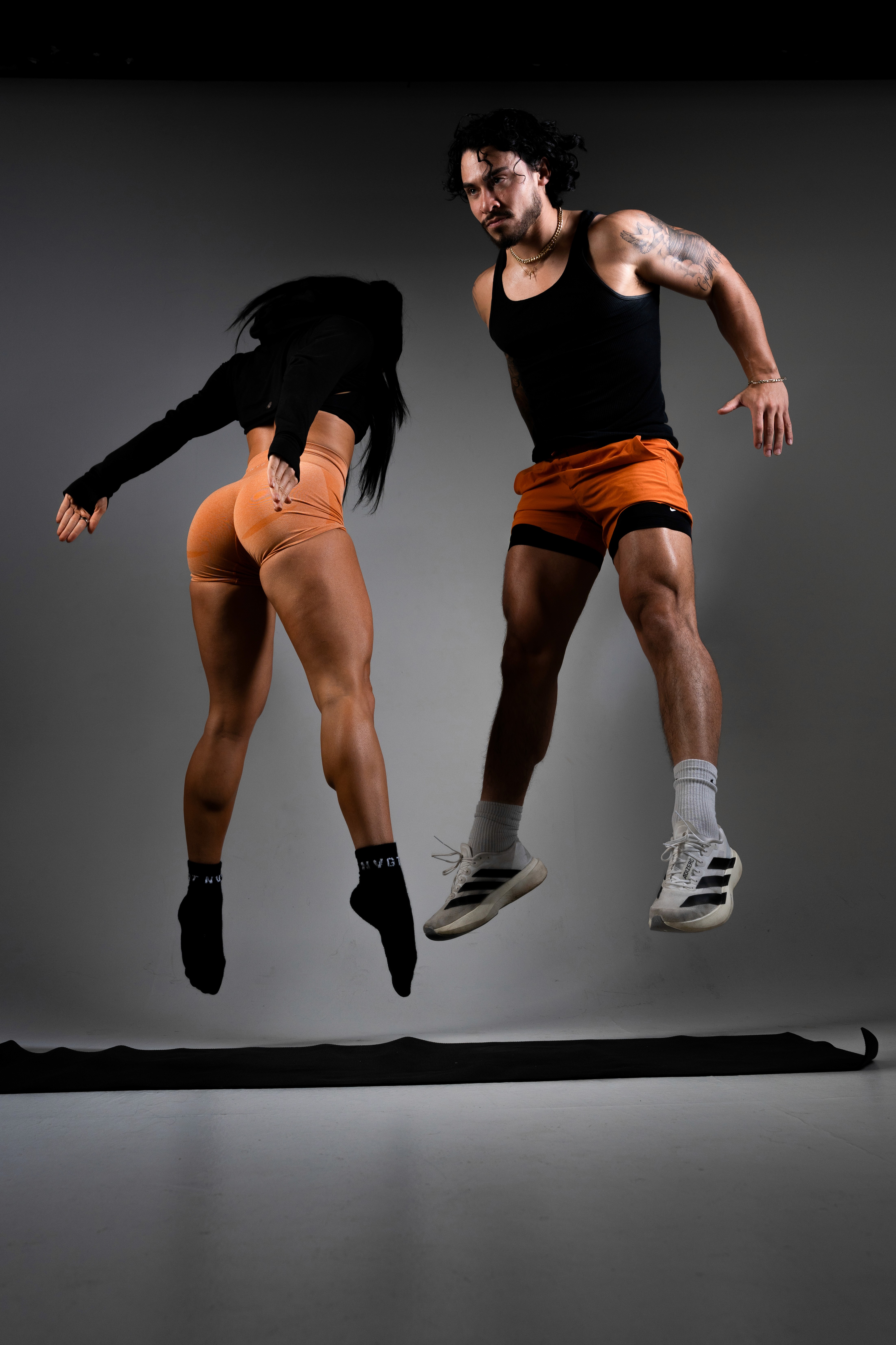 A smiley boy holds a table