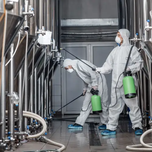 Ziva Cleaning Services team performing industrial floor cleaning in a Pennsylvania manufacturing plant