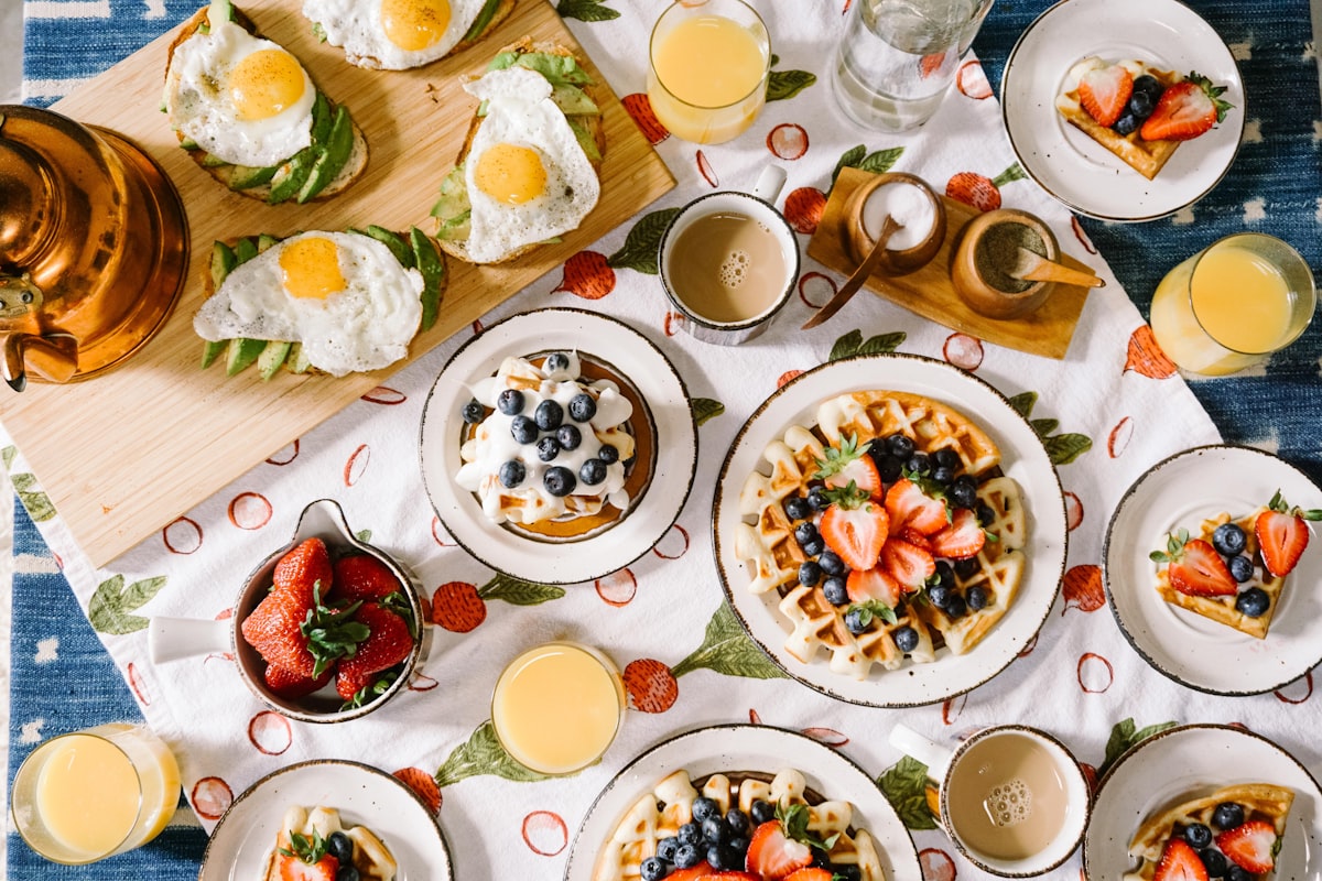Assorted restaurant dishes on a table representing popular food spots in Burlingame