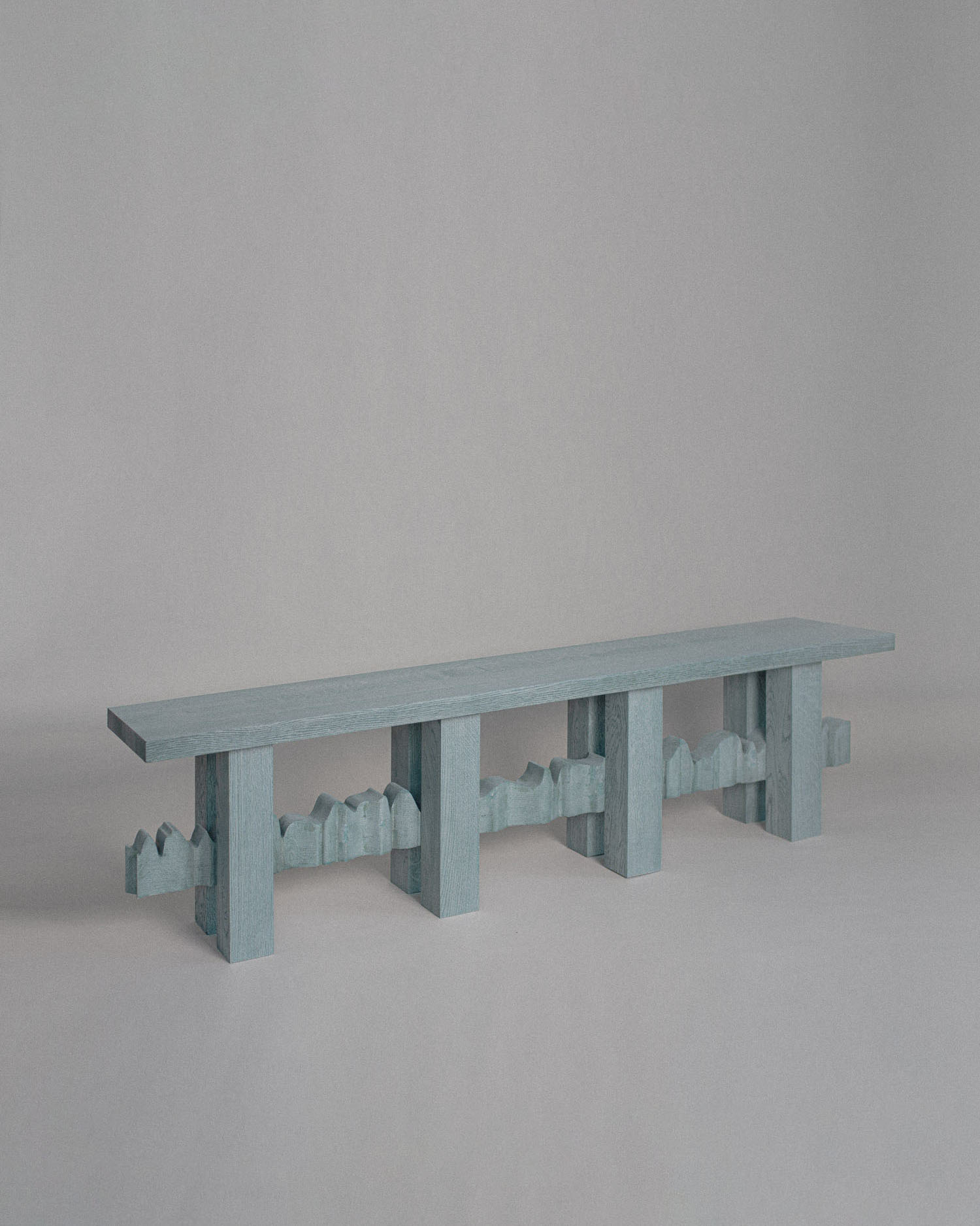 Minimalist YKB bench in moss green solid ash wood with clean lines, designed by Jiří Krejčiřík.