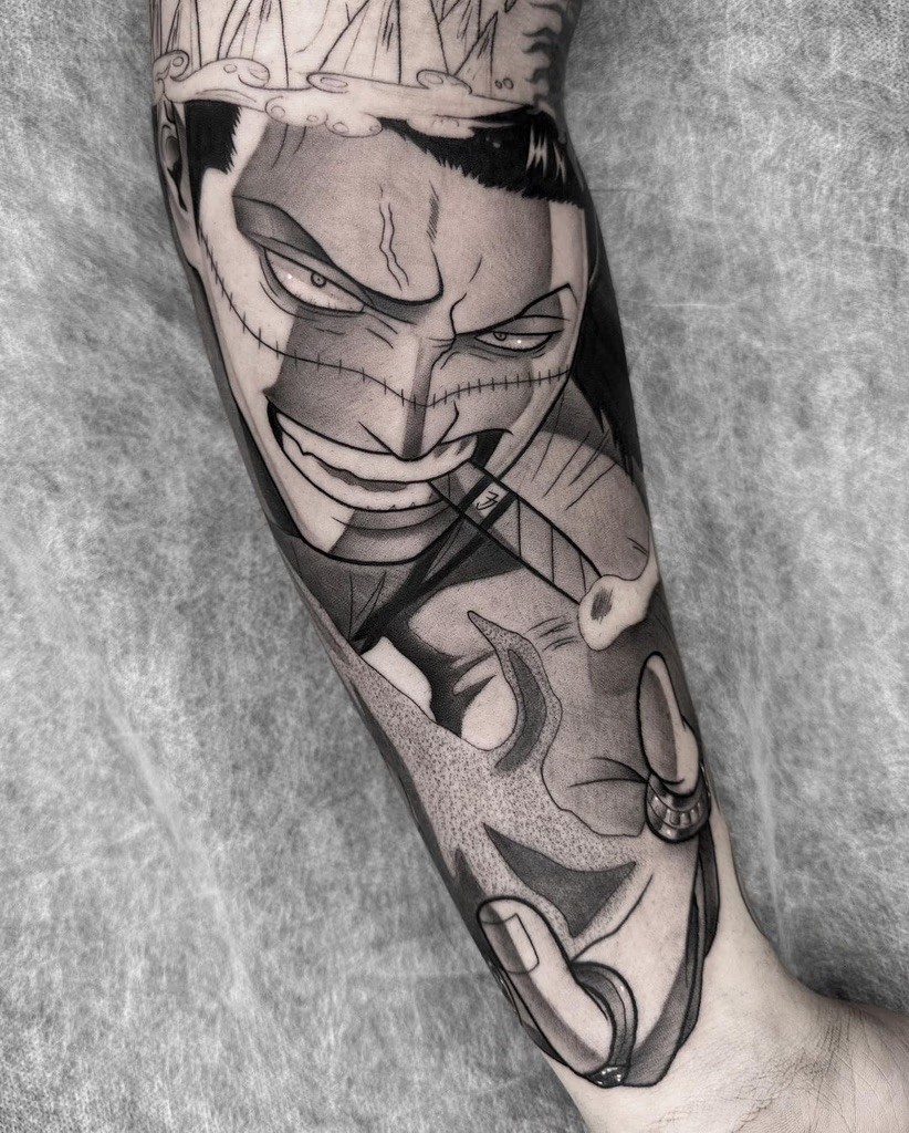 A detailed black-and-grey tattoo of Crocodile from One Piece, showcasing his menacing grin and cigar, designed by Juame.