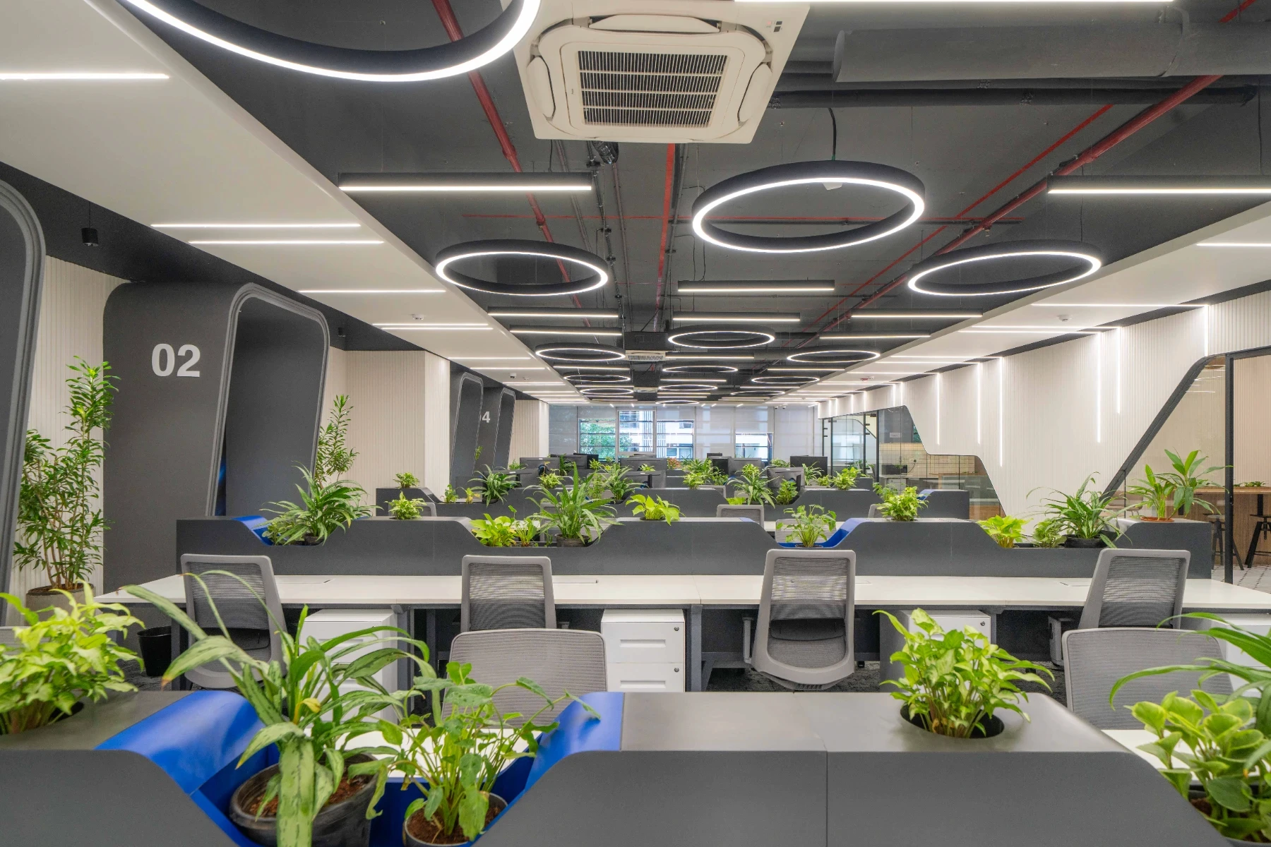 Workspace area of a office spaces designed by liquid space studio