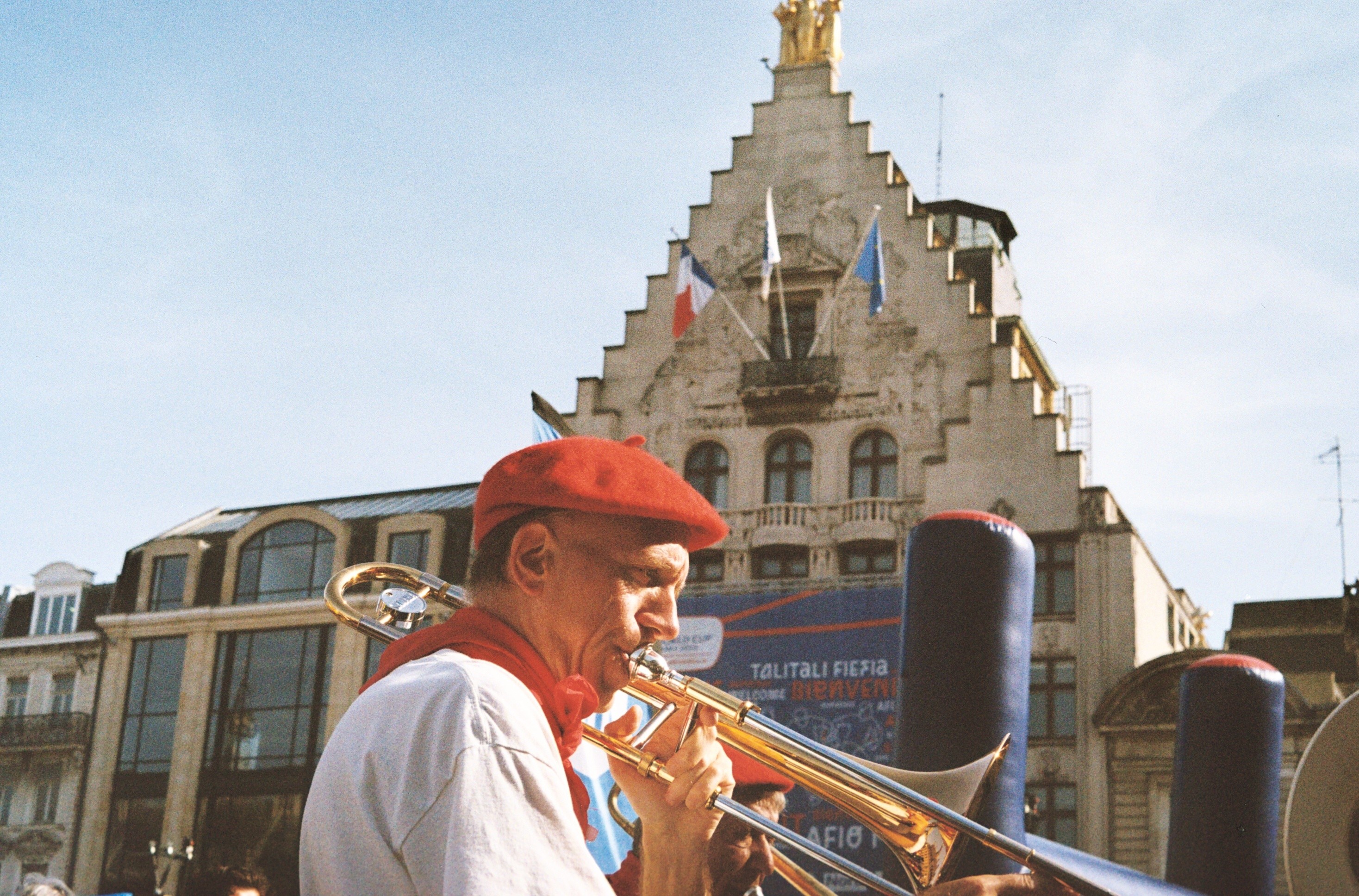 a woman holding a red flower
