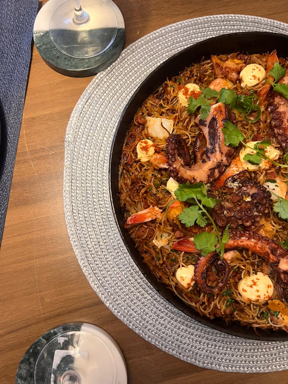 A seafood dish served at a private dining table