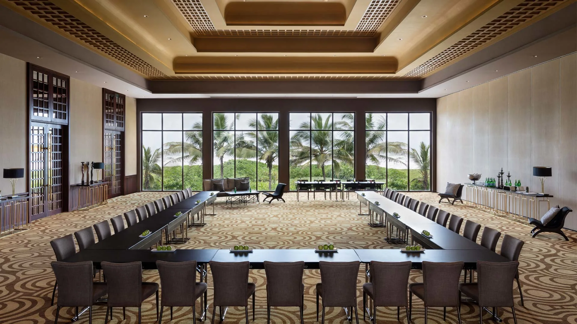 Woman holding a smartphone looking through the glass 