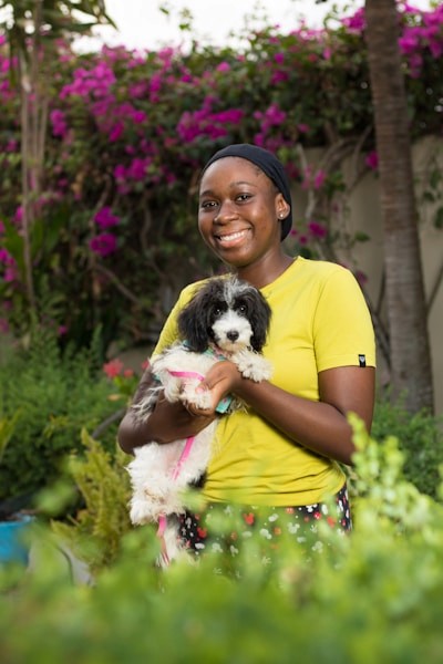 Pet owner with a small dog