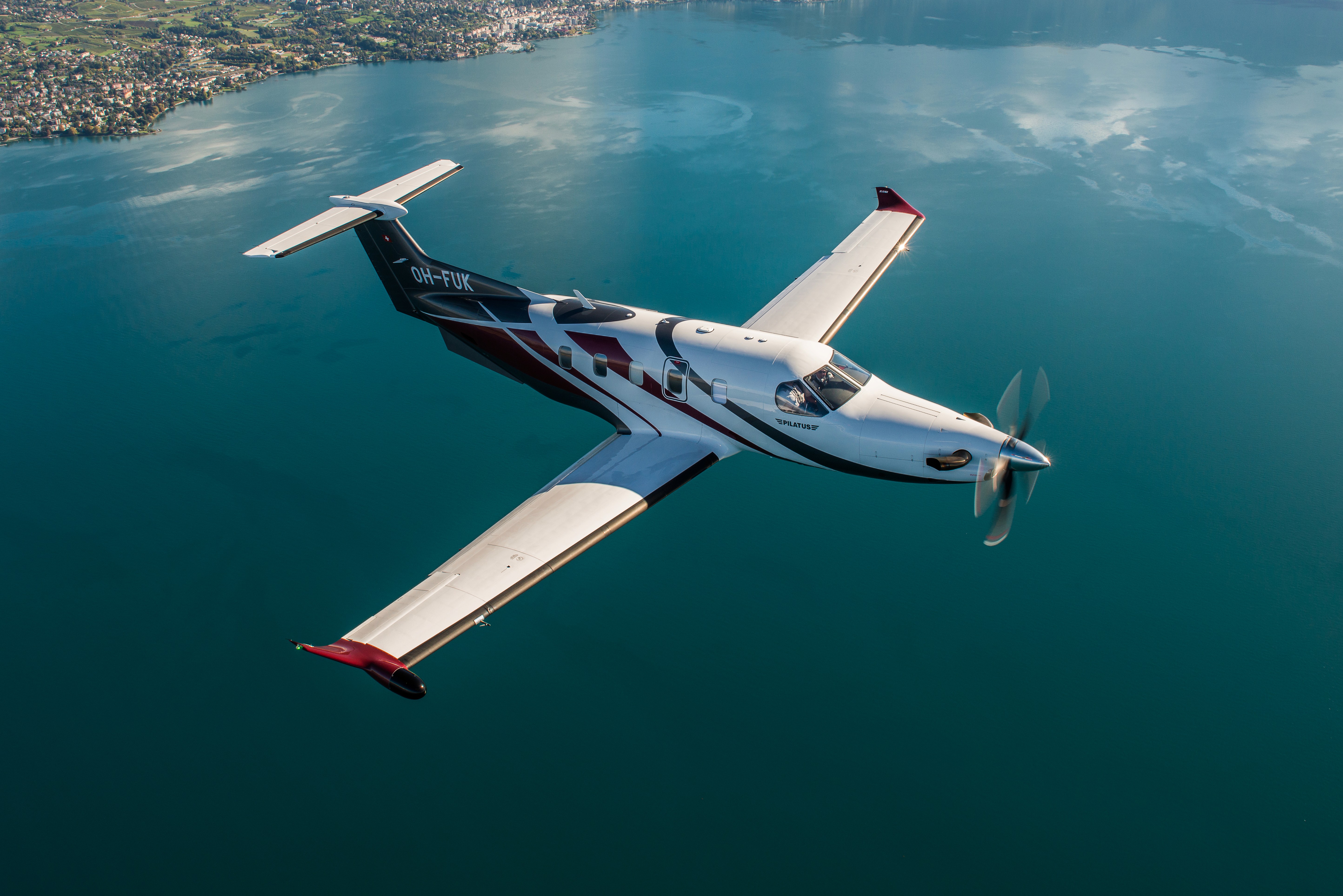 Pilatus PC-12 flying over Lac Leman