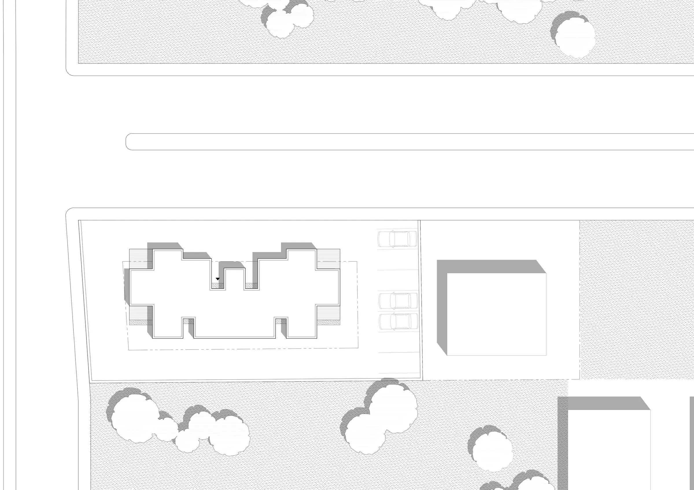 Site plan showing the building on its plot with surrounding trees