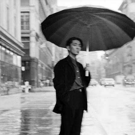 Stack of books with modern publishing design placed on bright white stairs