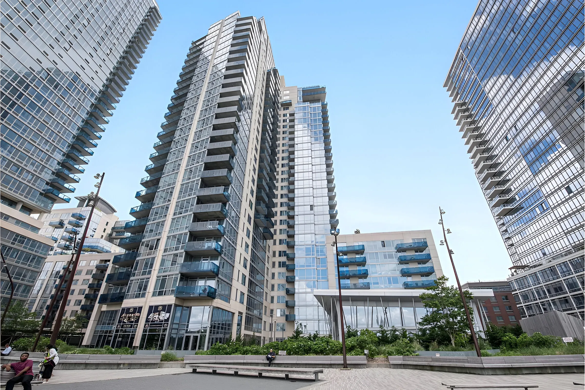 A skyline featuring a large group of tall buildings in an urban setting, showcasing modern architecture.